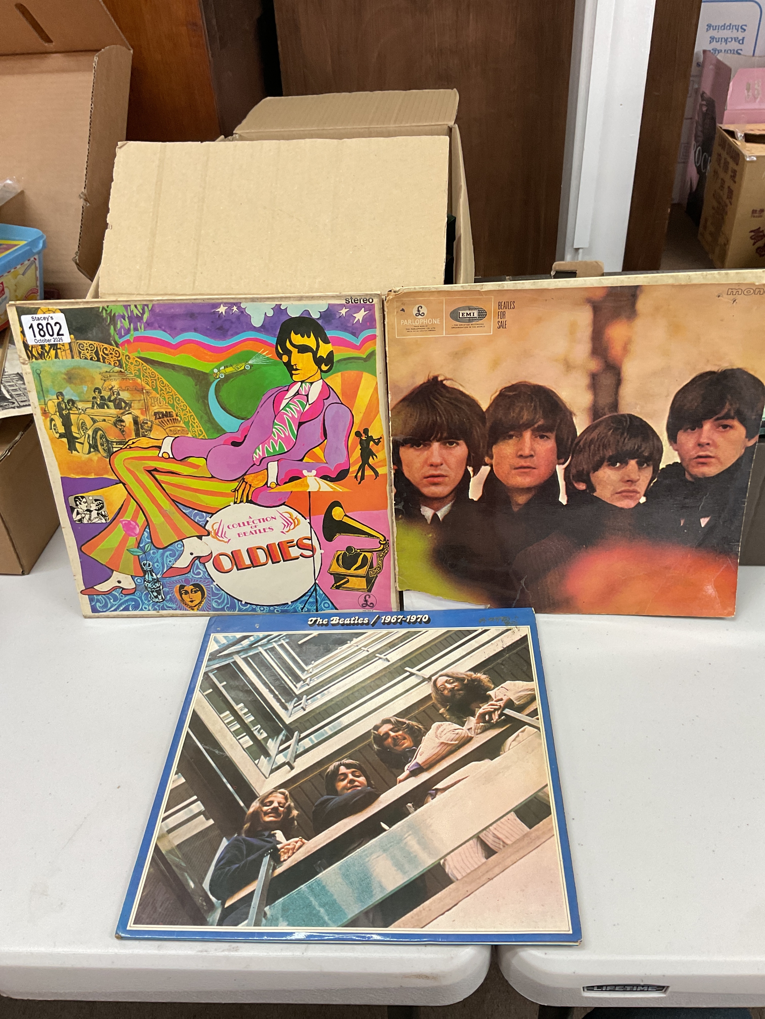 Three Beatles albums, 33rpm.
