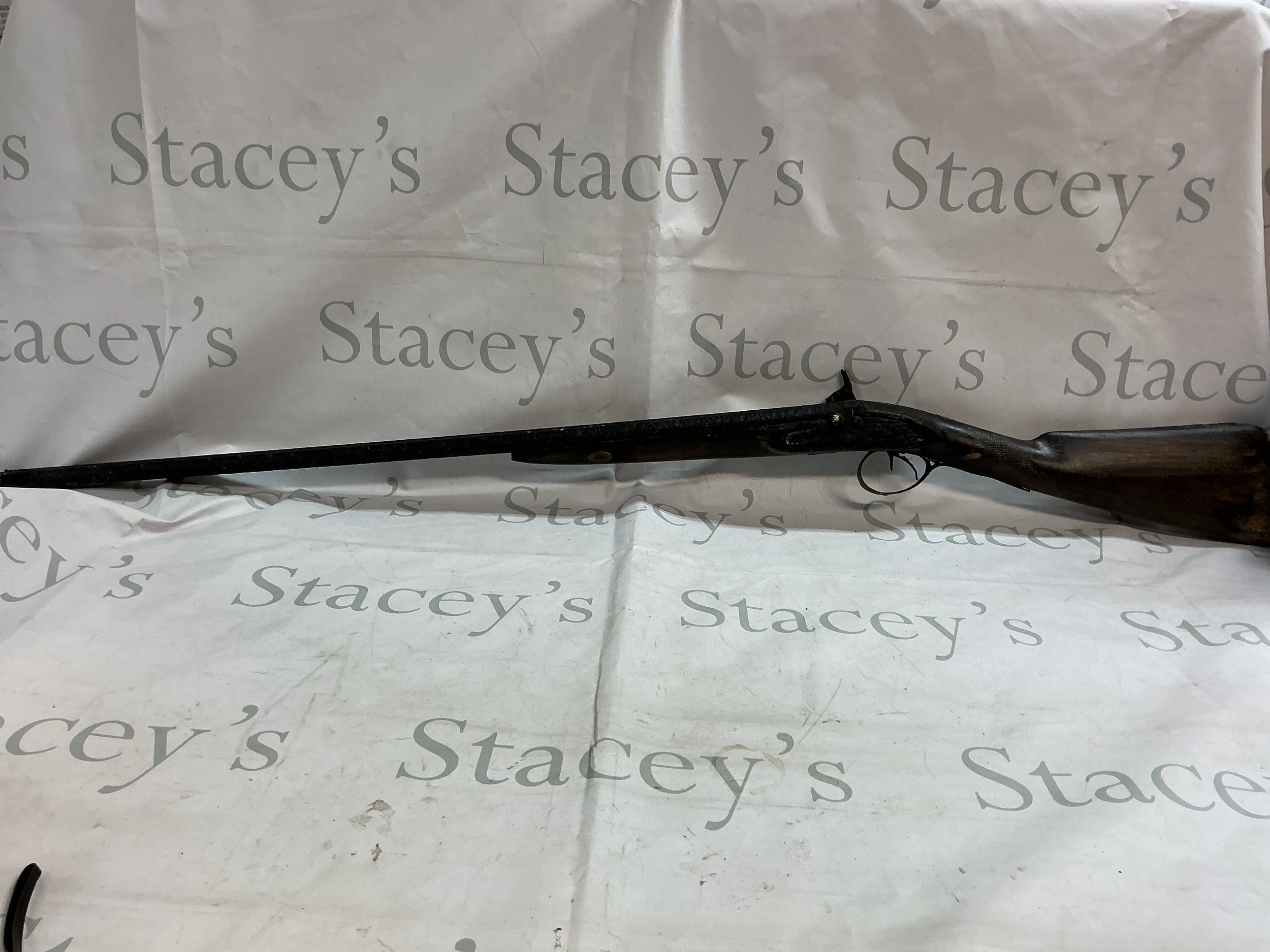 An Antique 19th century muzzle load shotgun.