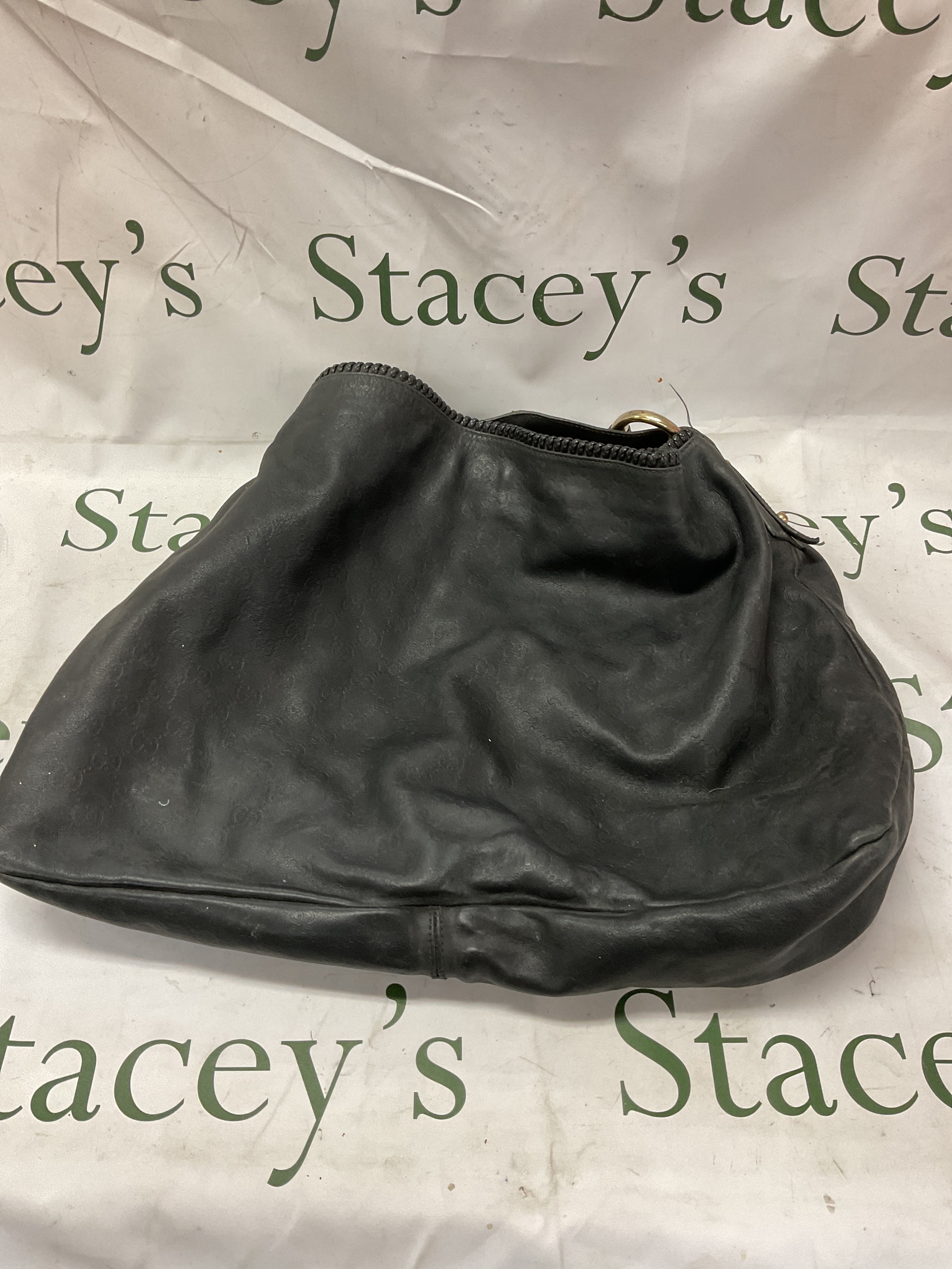 Gucci horse bit large bucket bag, black leather. Minor damage to bit joint. NO RESERVE