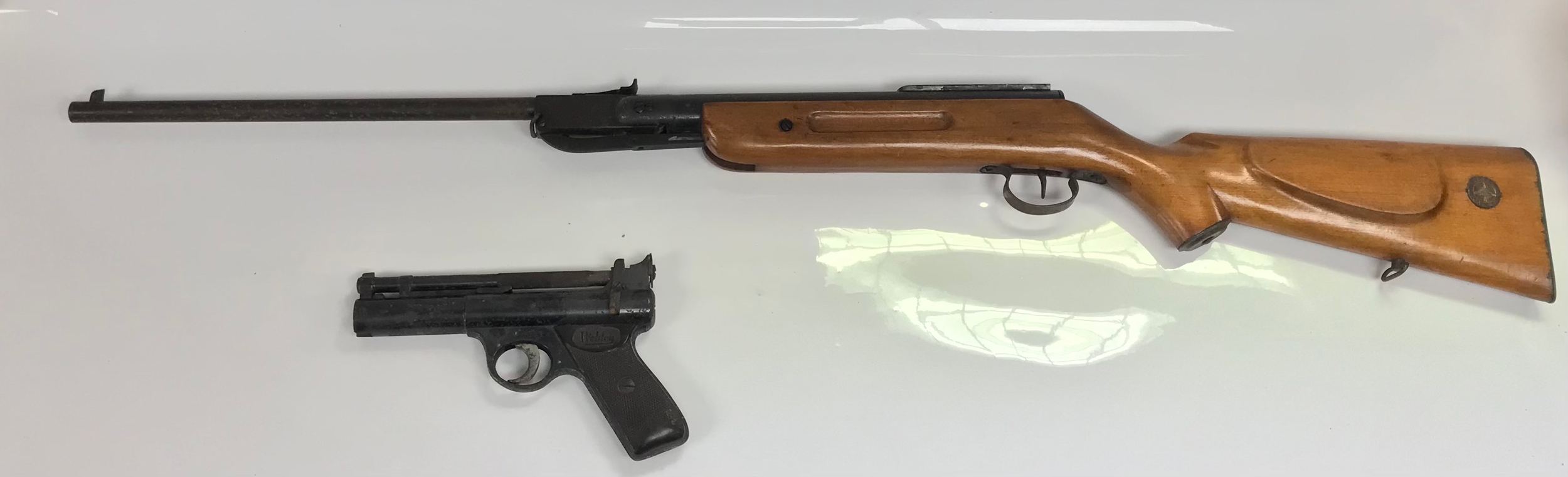 Two air guns, including a Webley senior over-lever air pistol  and a Diana model 35 air rifle.