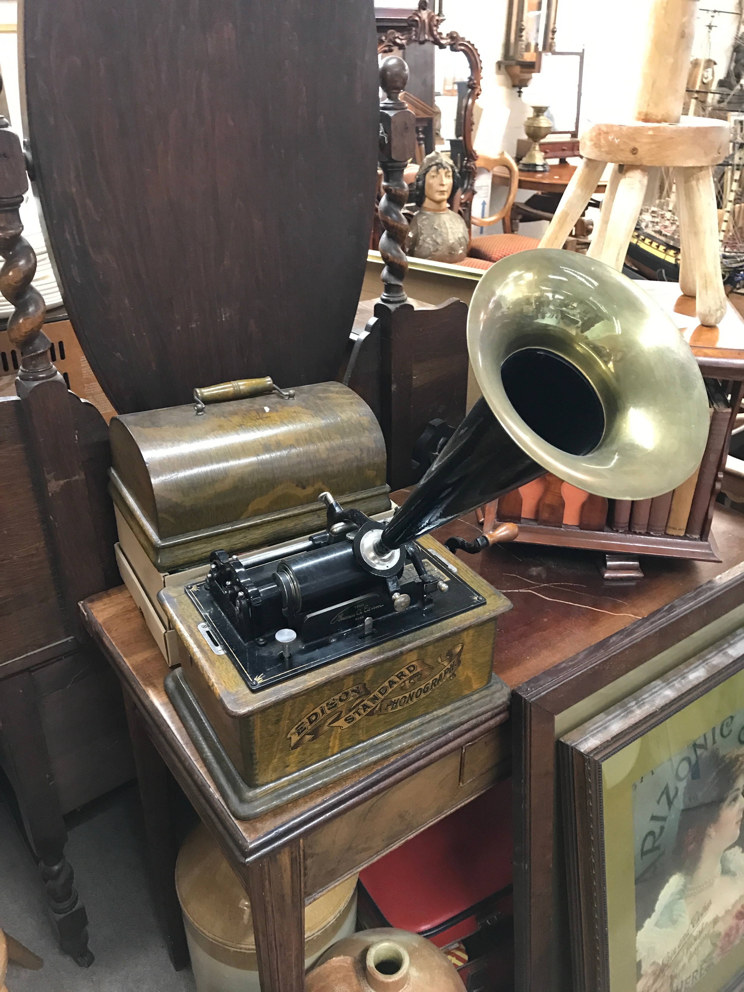 An Edison standard phonograph in oak case with horn and 11 cylinders, model C in good working condition 