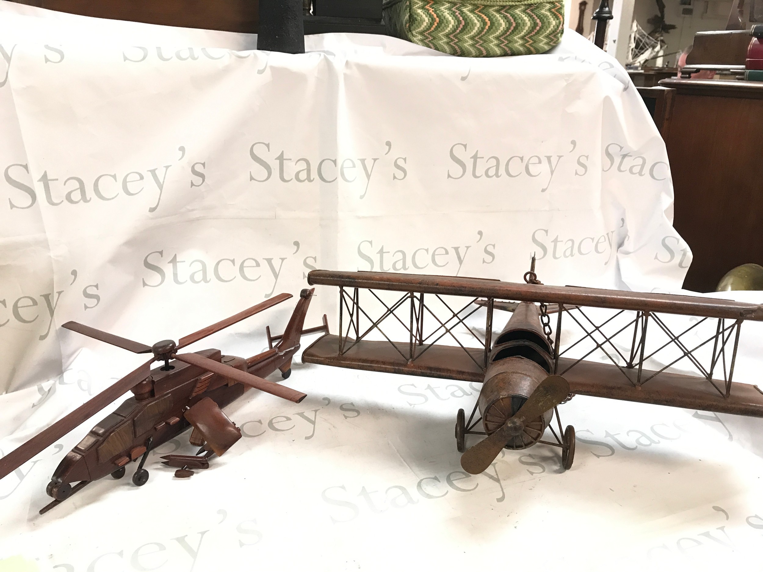 A model Helicopter wood sculpture and a plane (2)