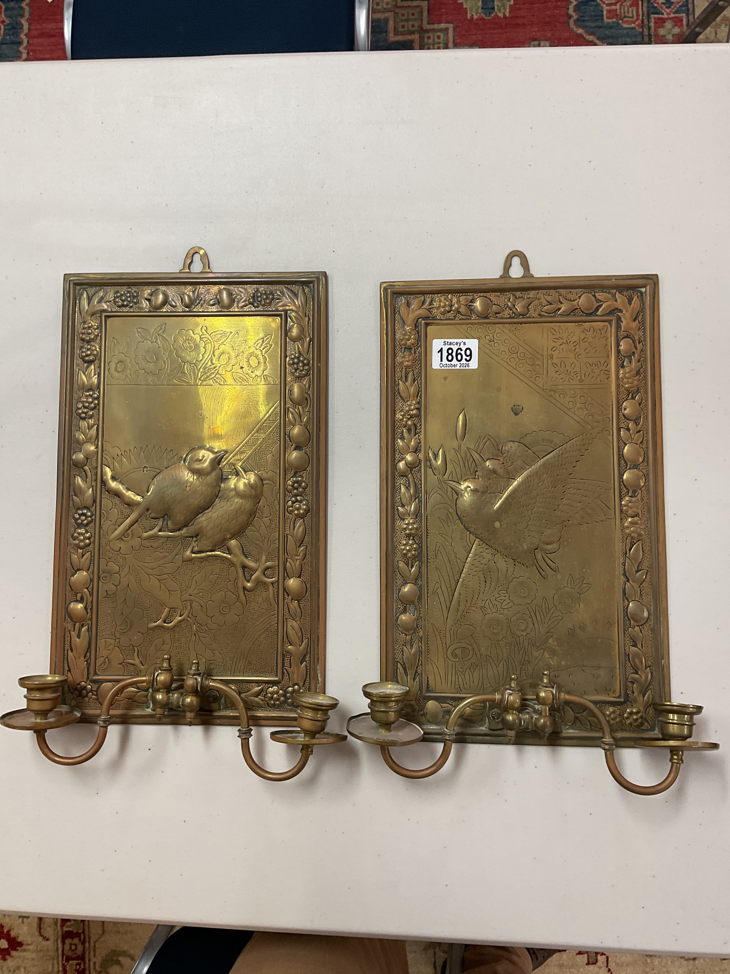 Pair ornate bird decorated brass twin wall sconces 