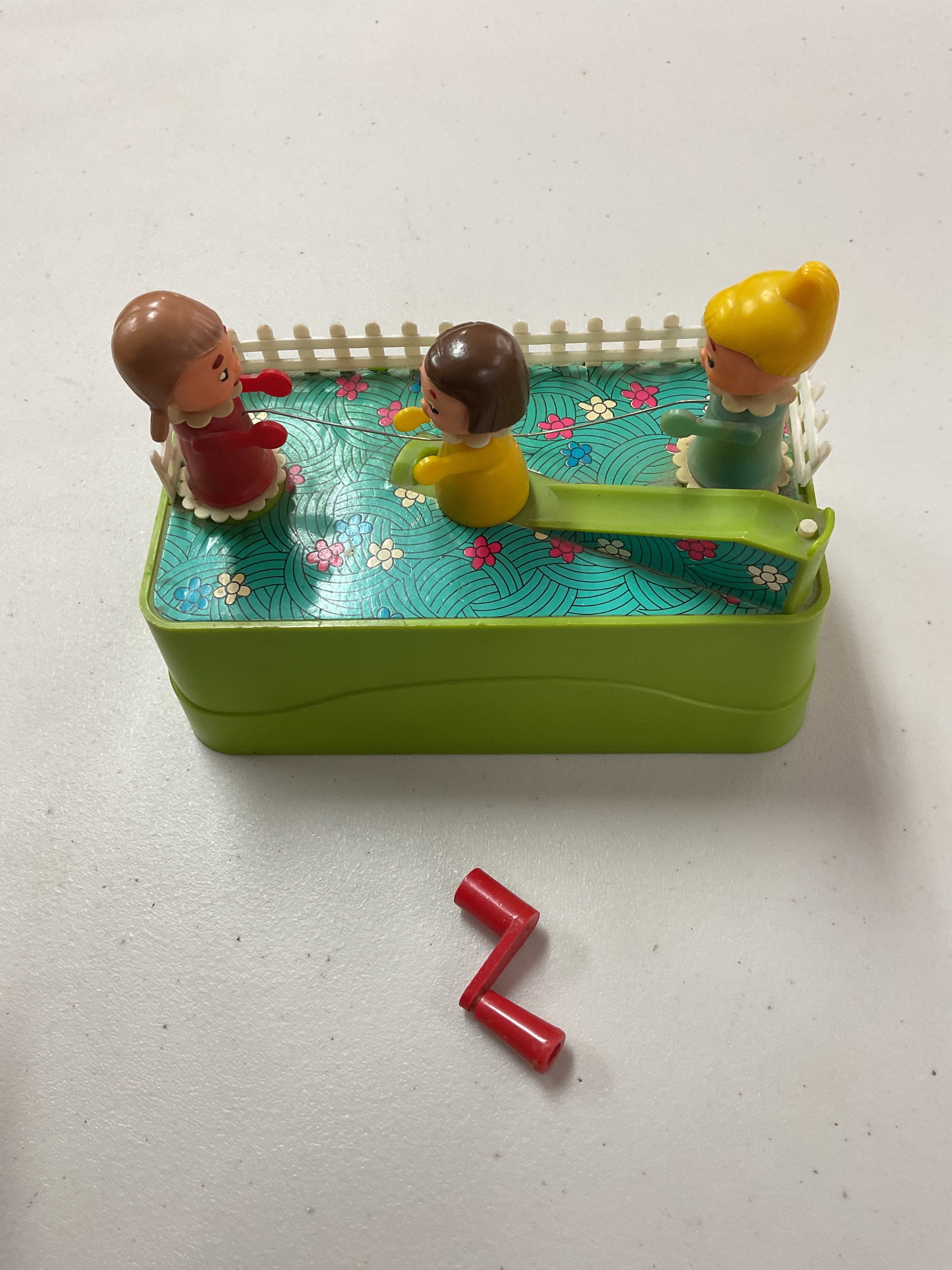 Pre Fisher Price Vintage toy of children skipping with handle.