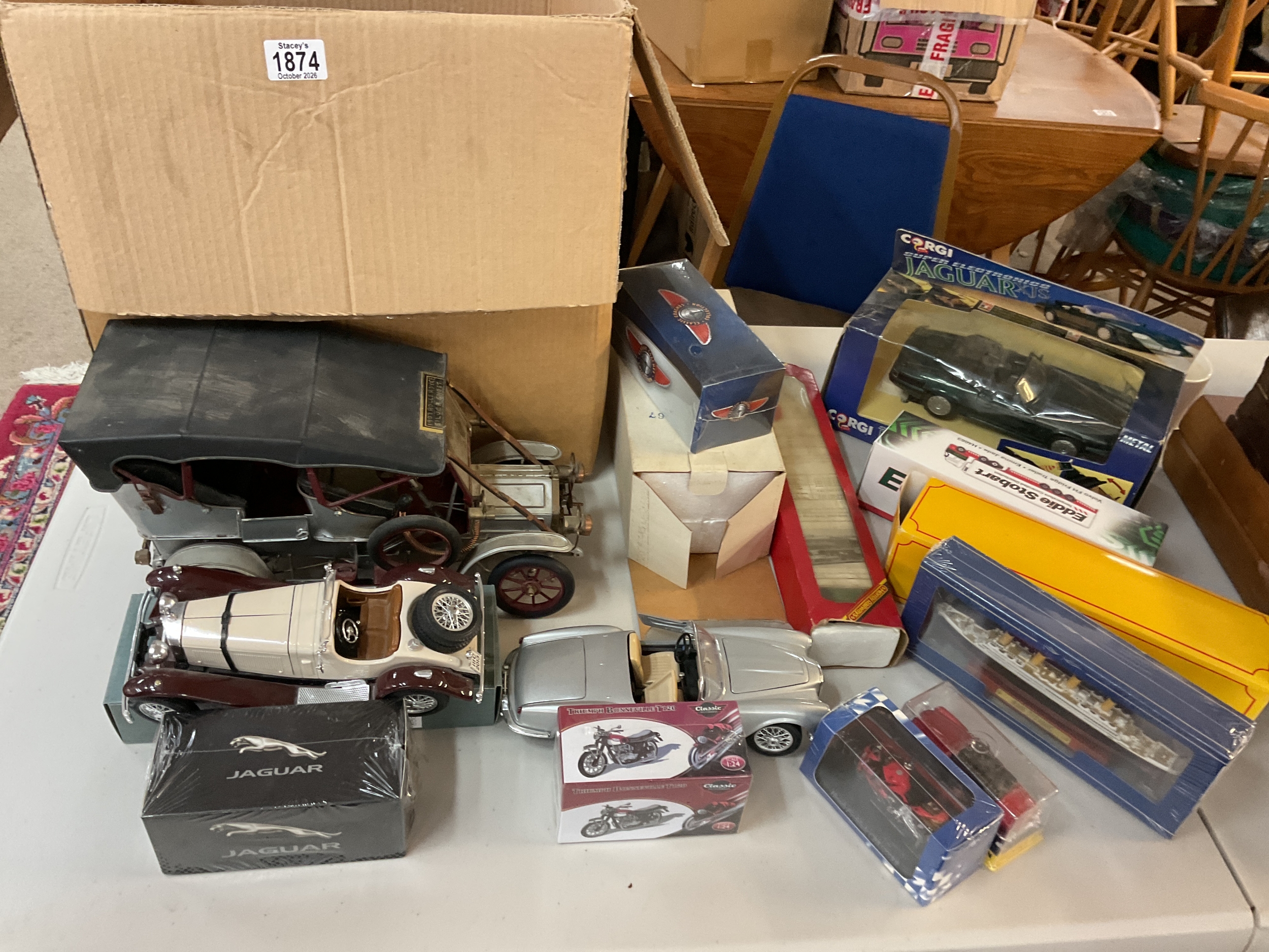 Large qty boxed die cast vehicles, boats, and scratch made 1906 Rolls Royce.