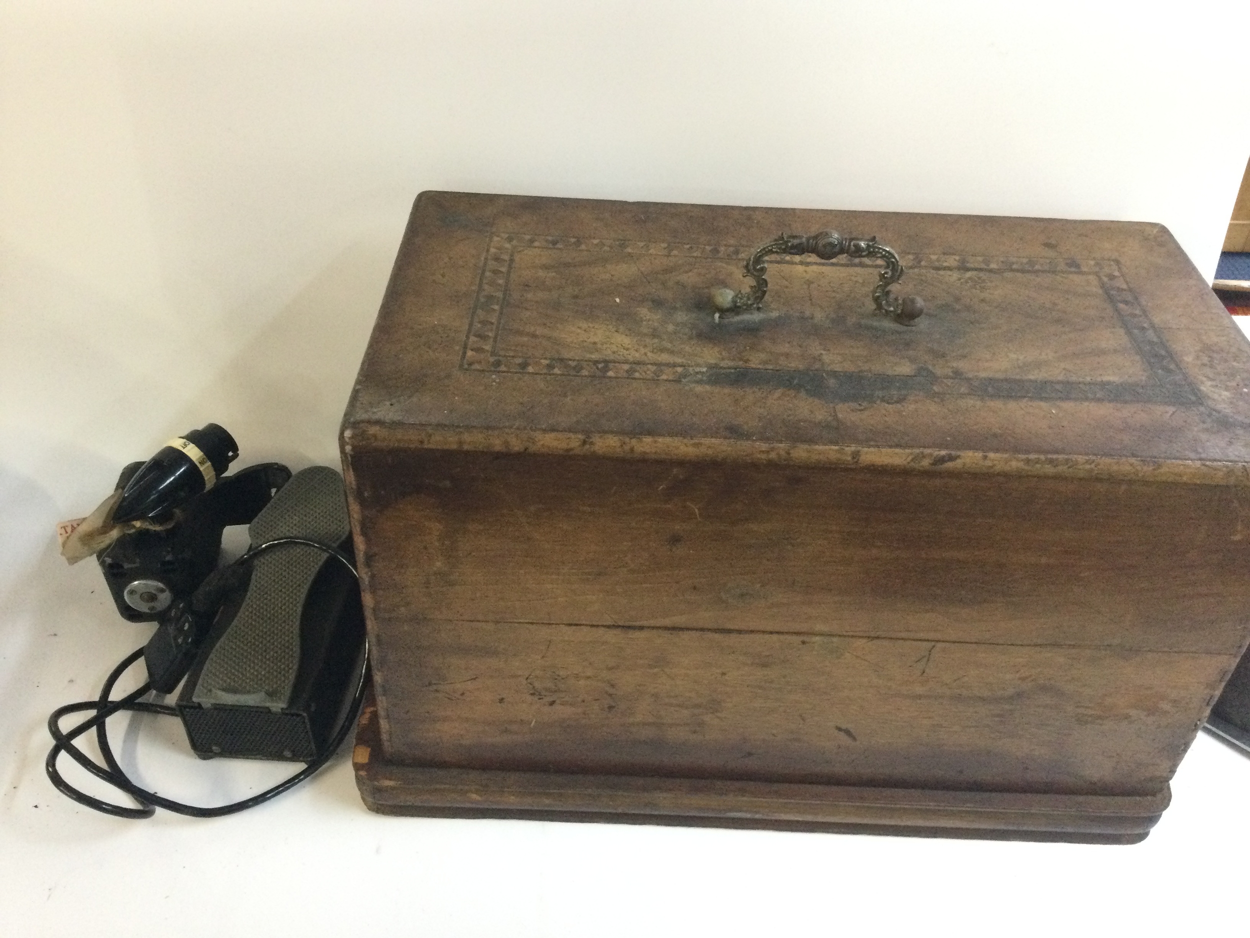 Locked sewing machine and pedal