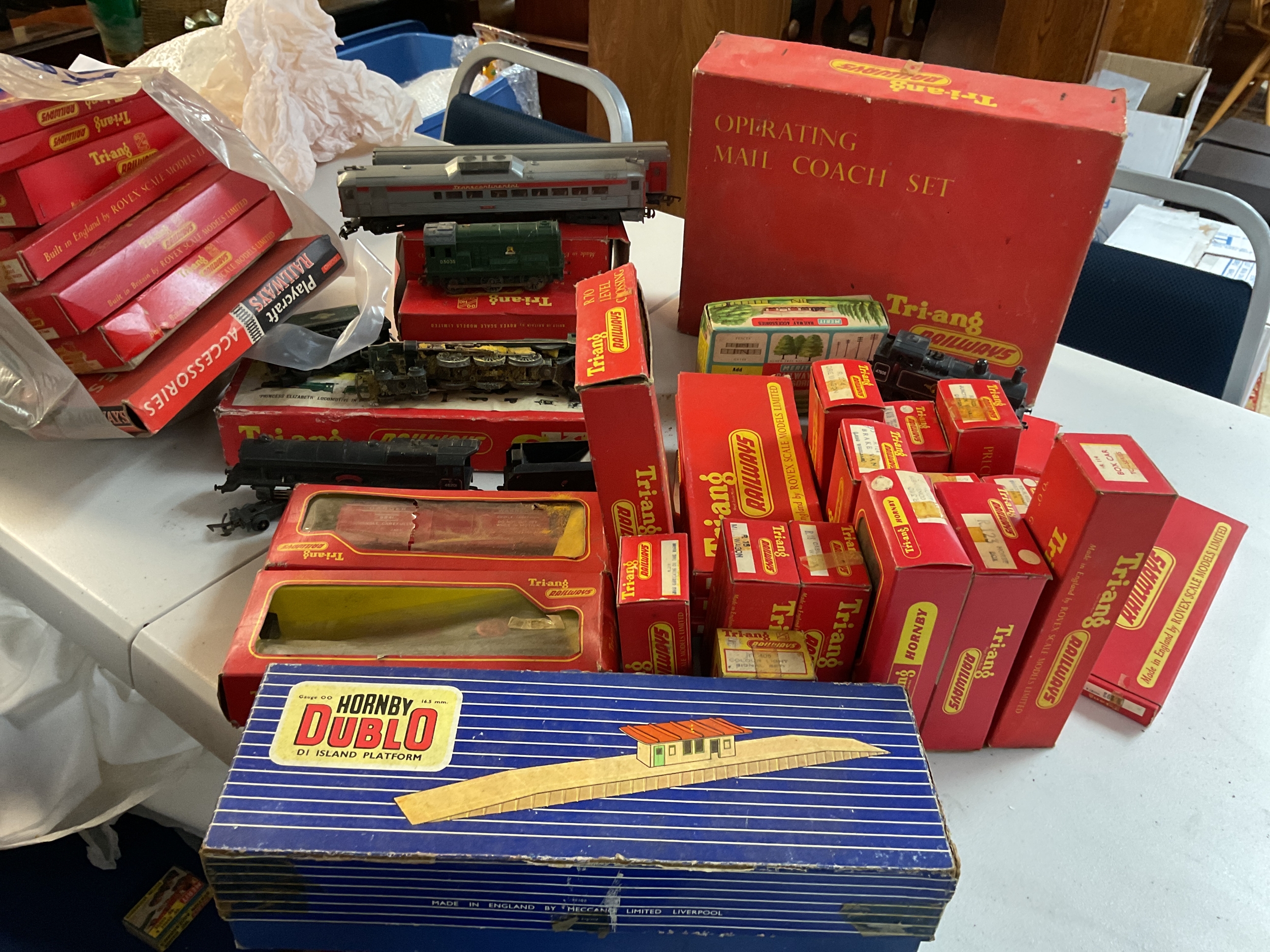Large qty boxed Triangle trains, track, rolling stock and buildings.