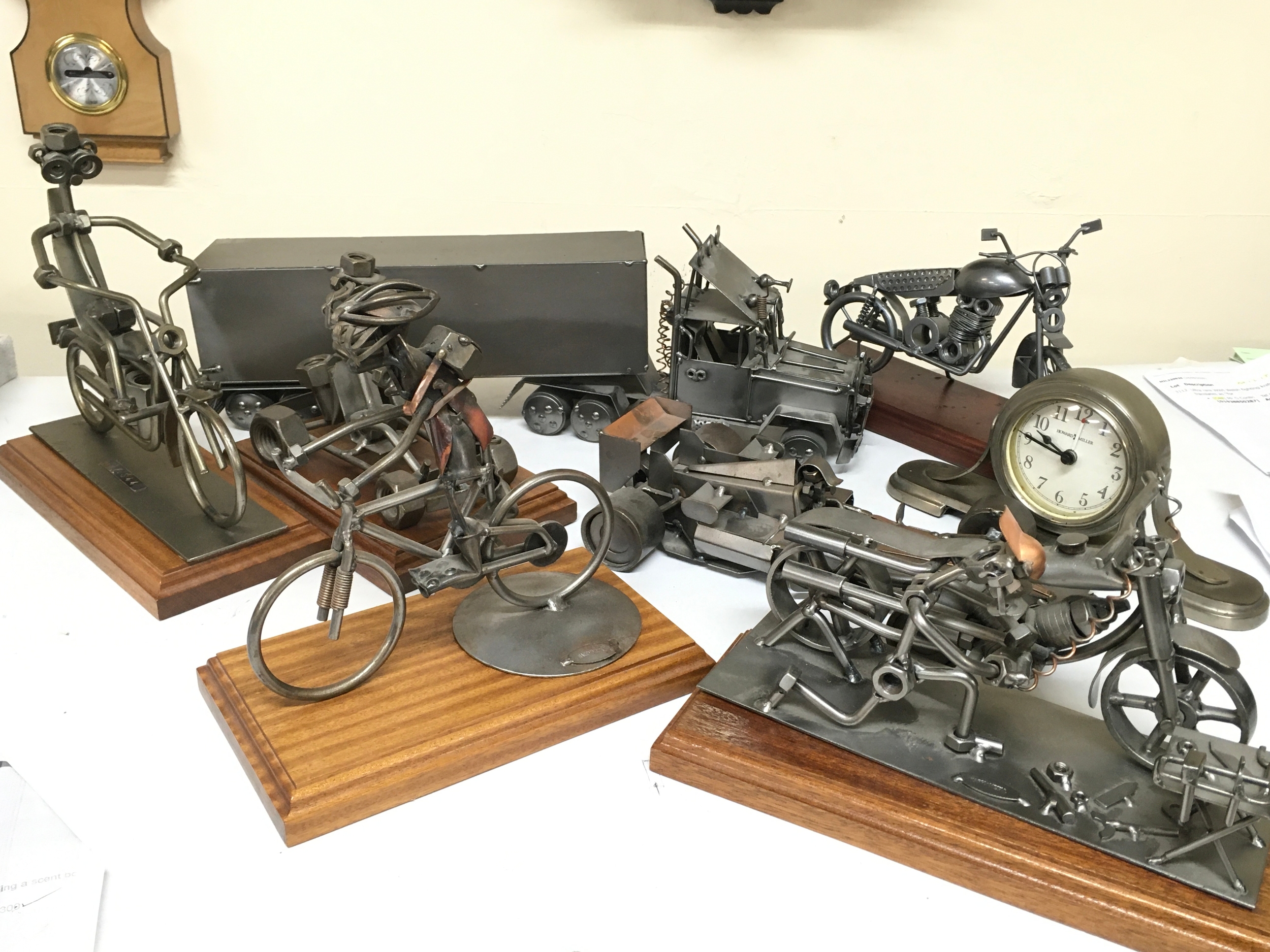 A Collection of 'Happy Metal' and other handcrafted metal figures including motorcycles, go kart, race car, truck model 