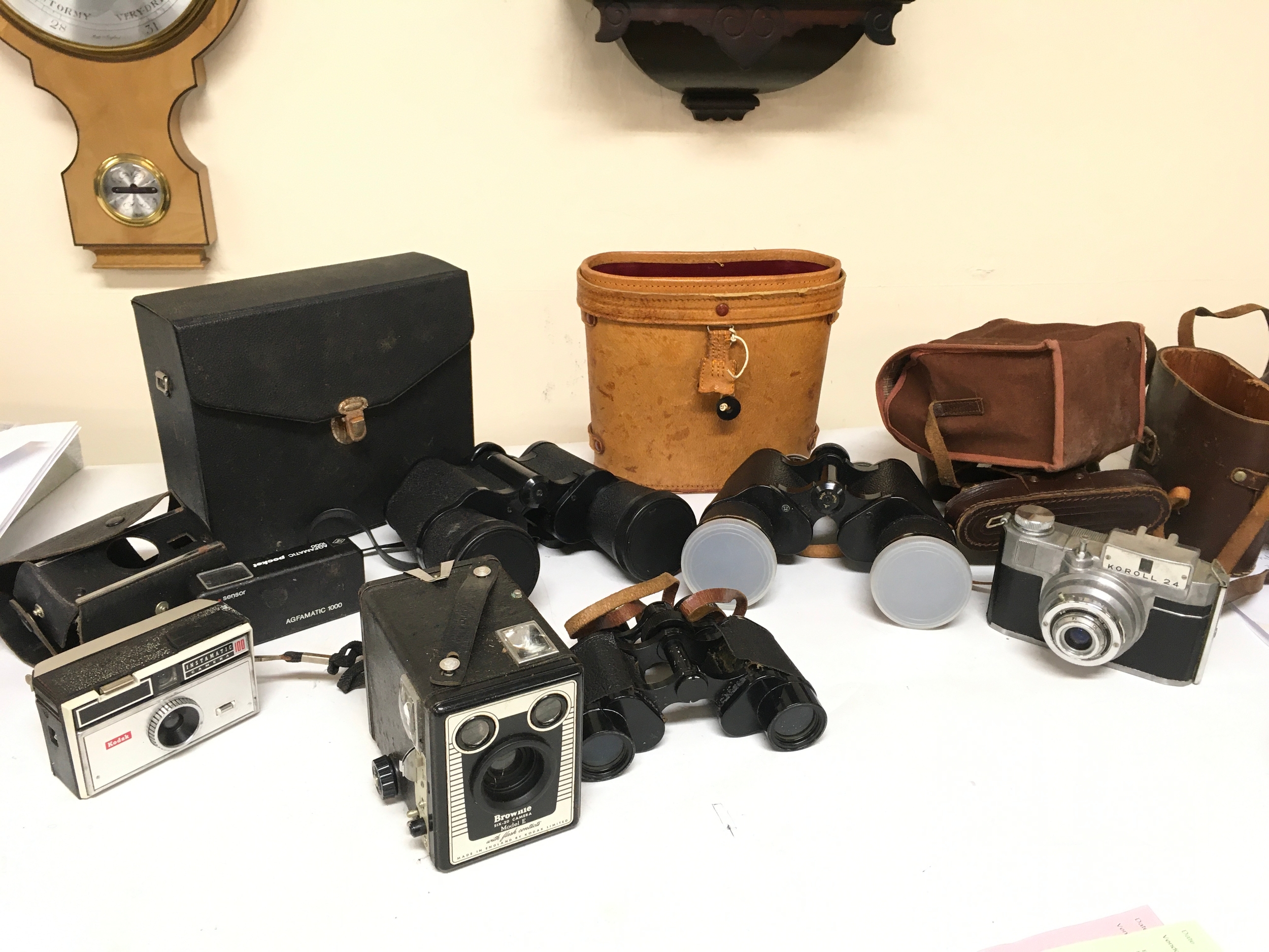Binoculars and cameras Brownie Six-20 model E, Kodak Instamatic 100, Koroll 24, 8x25 Denhill binoculars, Prinz 10x50, Vesper 16x50