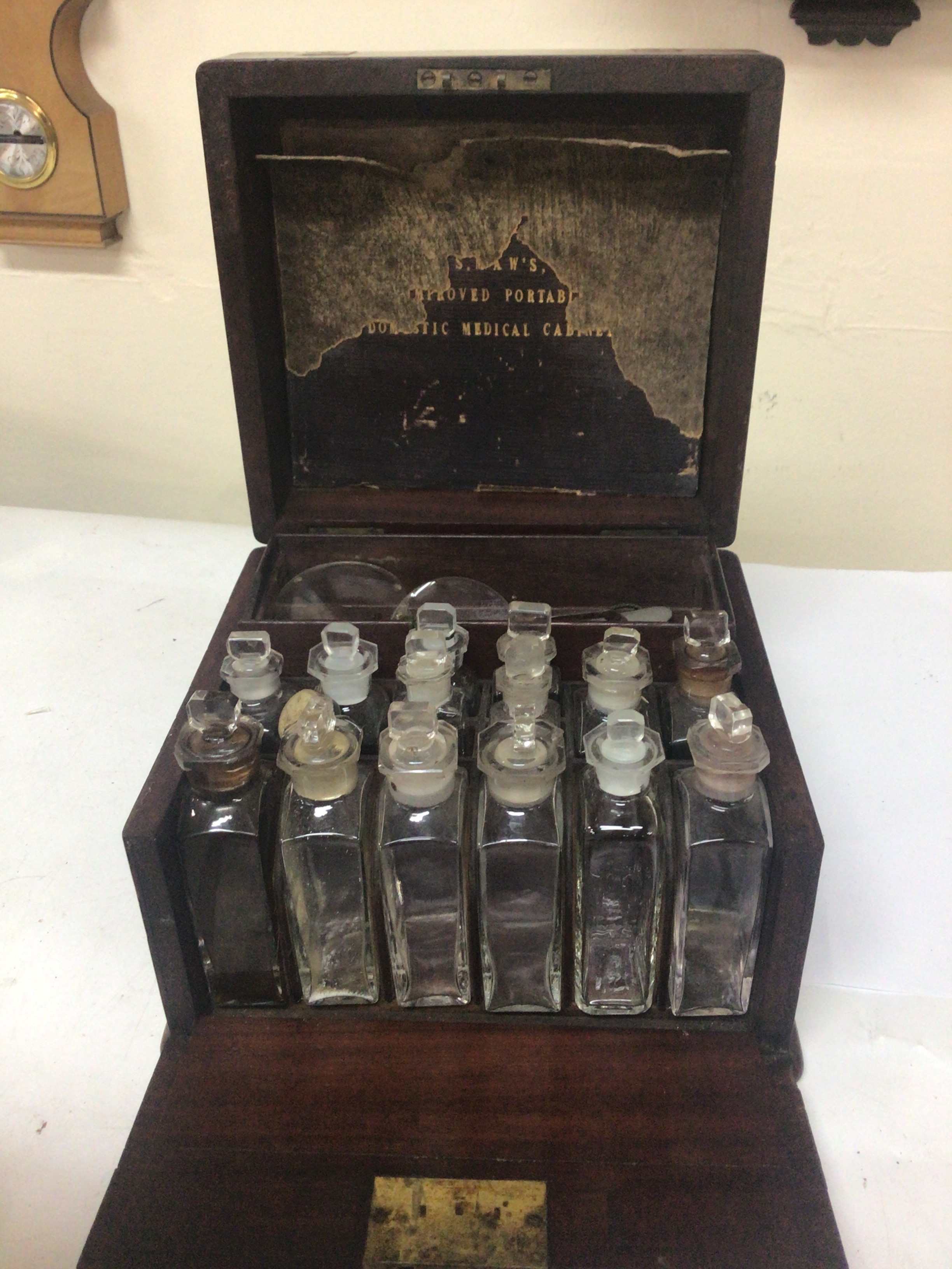  A19th century Campaign Domestic Medical cabinet the brass bound mahogany box with a well fitted interior with bottles and accessories. Box with key 