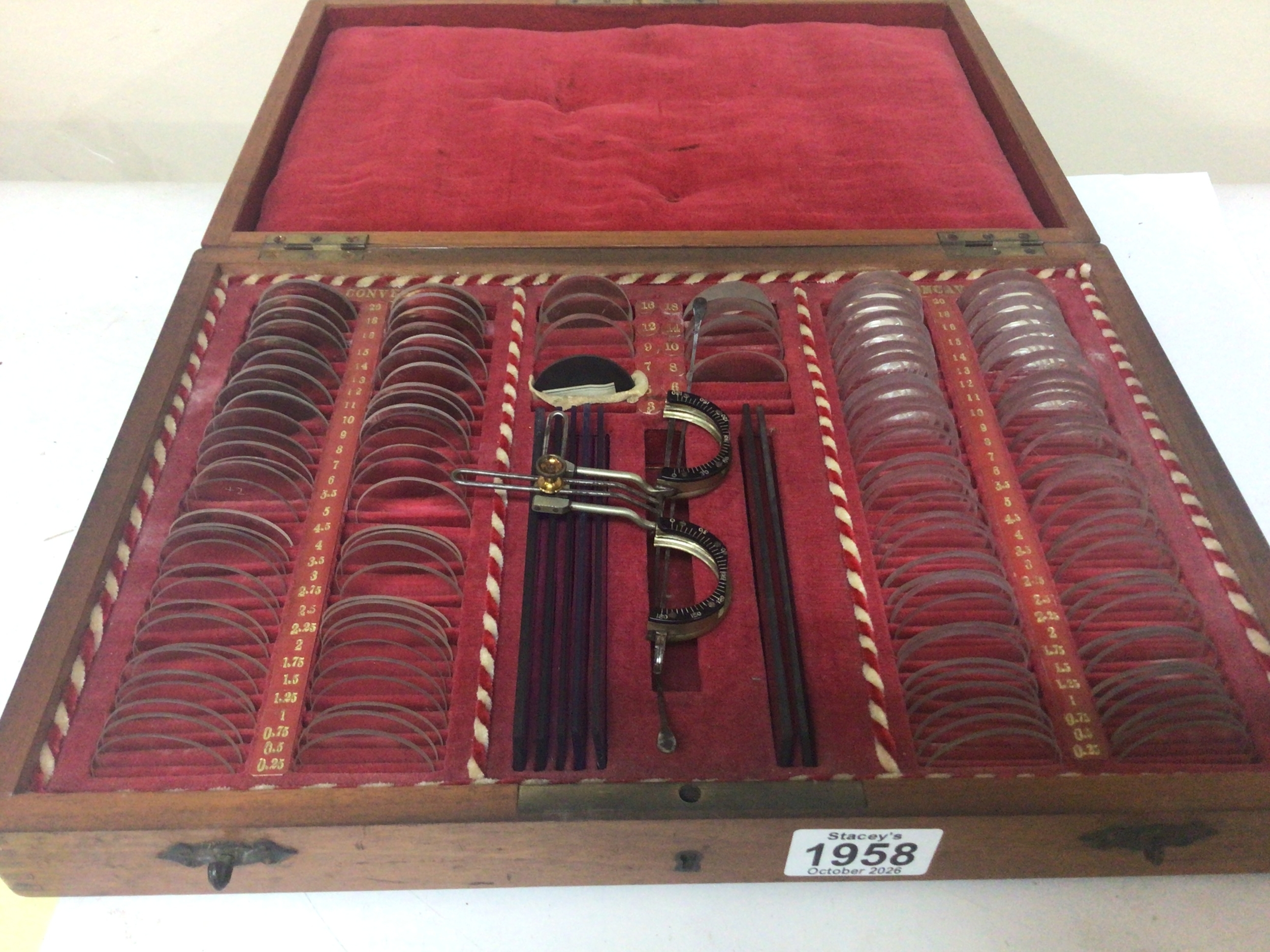 A Vintage opticians lens case well fitted interior. Mahogany case velvet lined.
