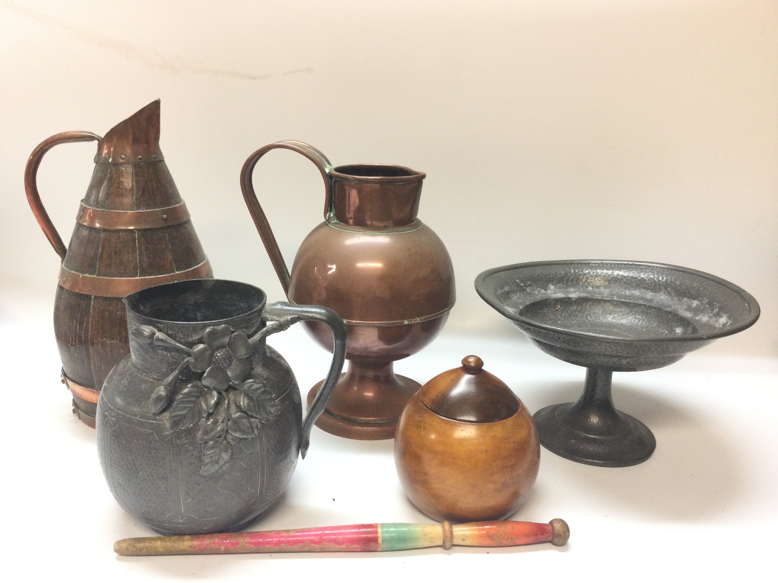 Pewter and copper pieces and a hardwood condiment jar