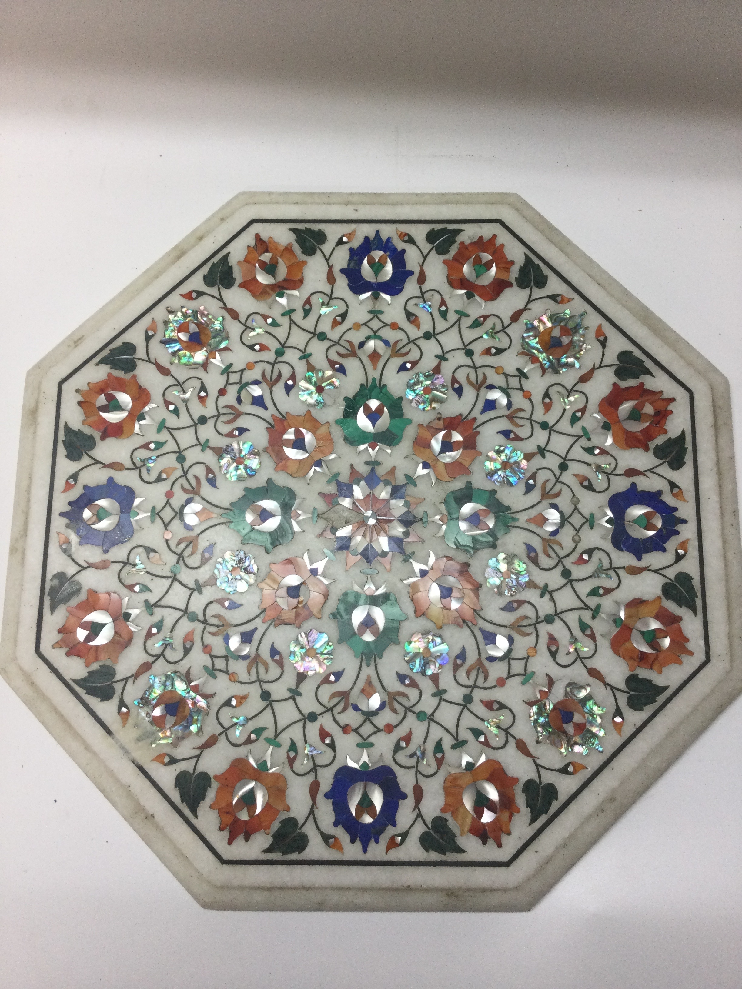 A fine Indian Pietra Dura Inlaid White Marble octagonal table top