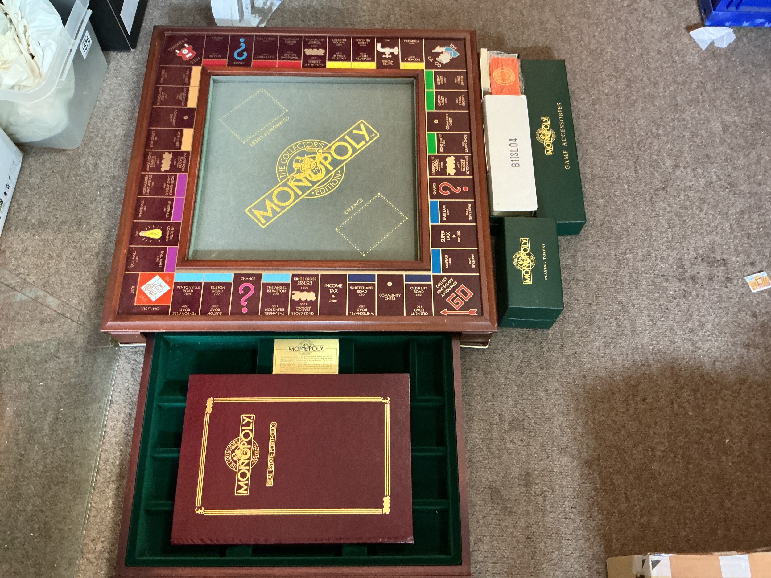A deluxe Monolopy walnut table top collector's set.