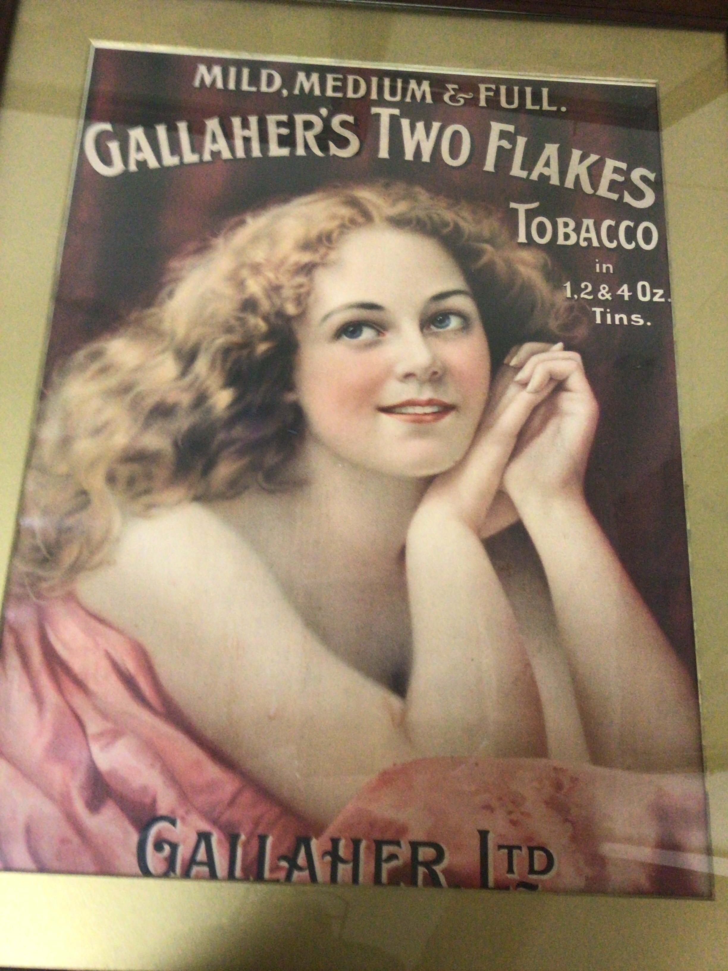 A Vintage Gallaher's Two flake Tobbaco advertisement in an oak frame. NO RESERVE
