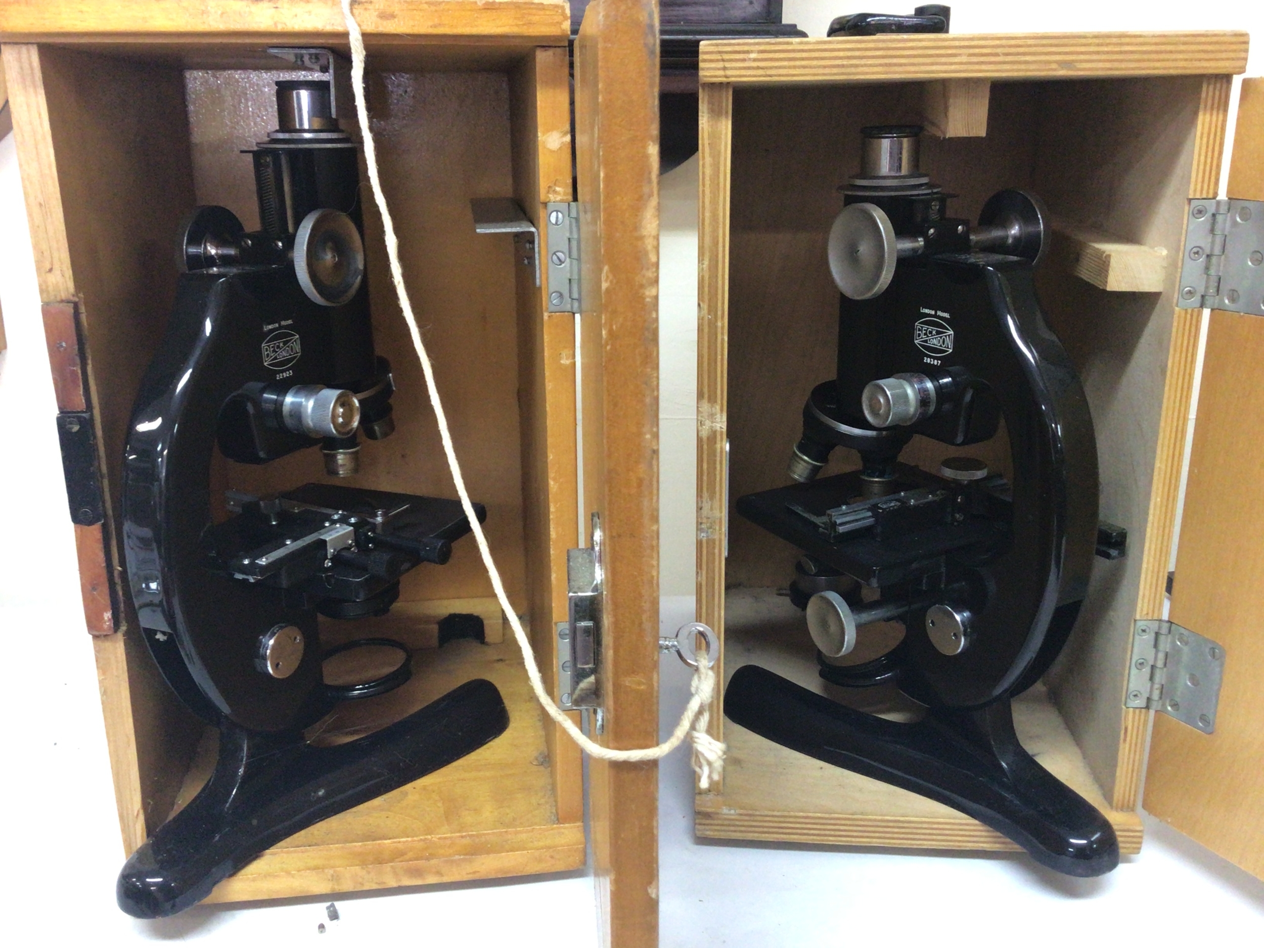  Two Microscopes Beck of London serial numbers 22923 and 28367 both in fitted boxes (2) 
