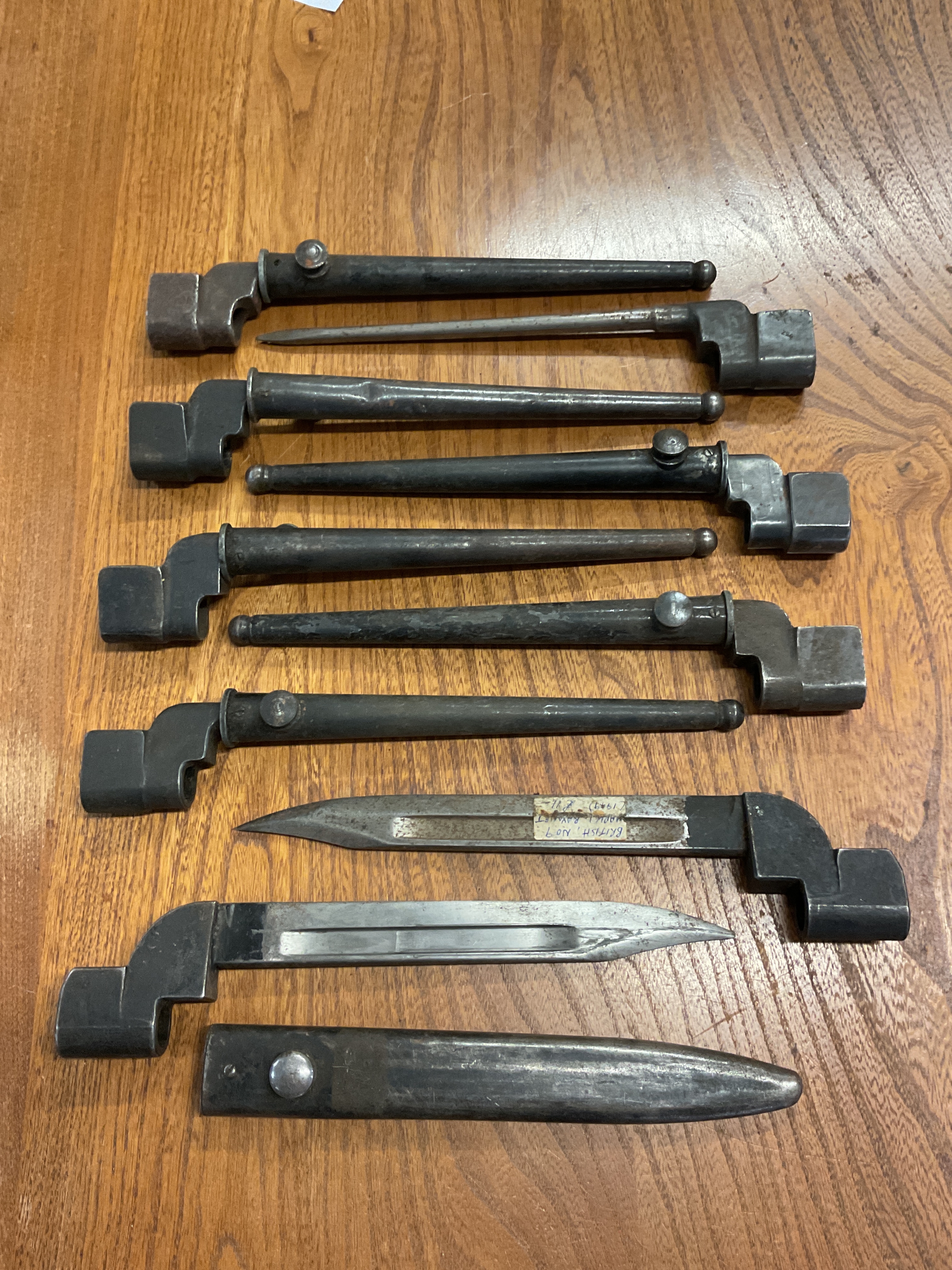 Nine bayonets for WWII Enfield rifle.