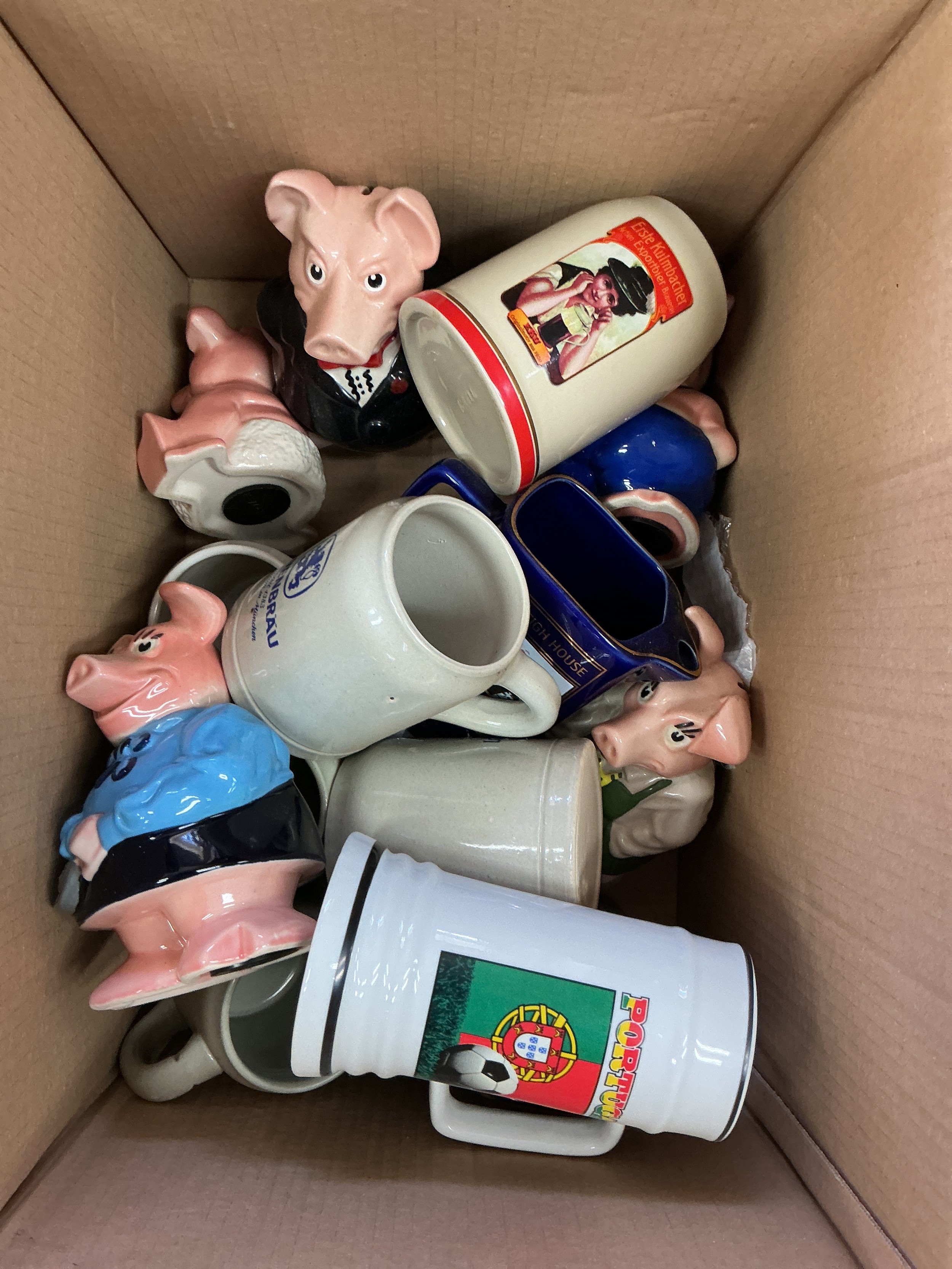 A box of china including Wade NatWest pigs, breweriana tankards etc.