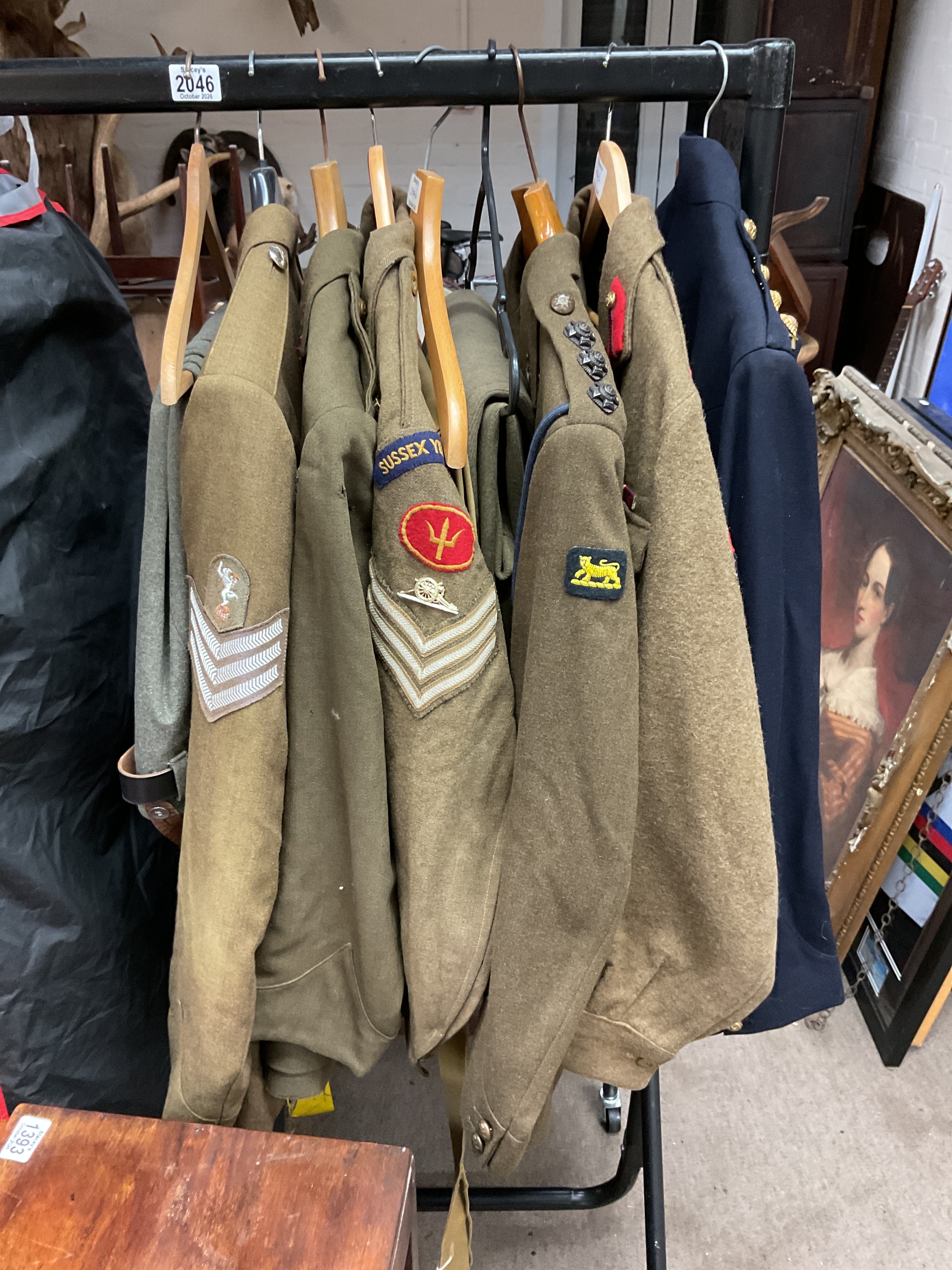 Nine WWII and post war tunics and trousers, to inc some high ranks and mixed regiments.