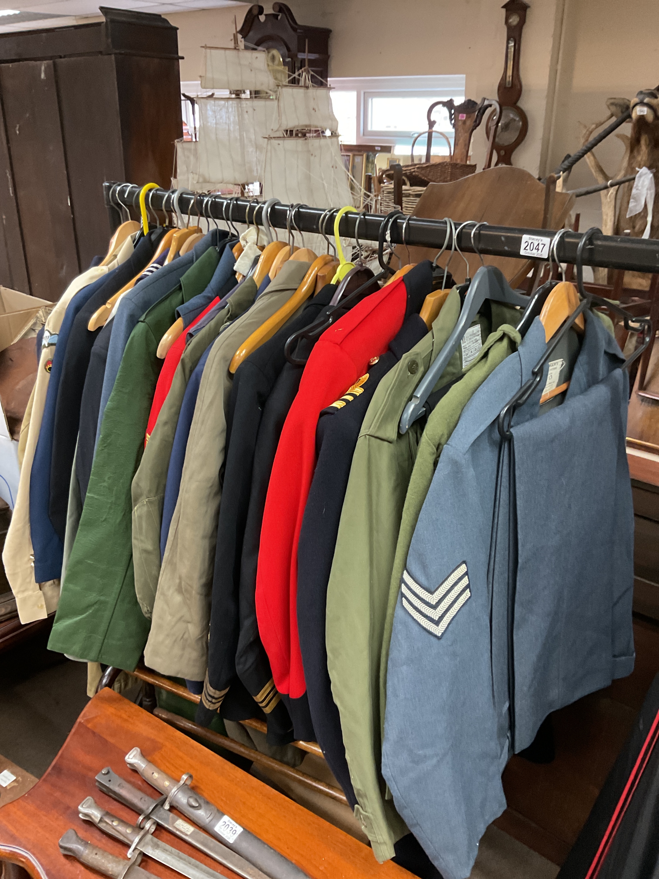 Mixture of post war tunics and trousers, UK, US, French etc.