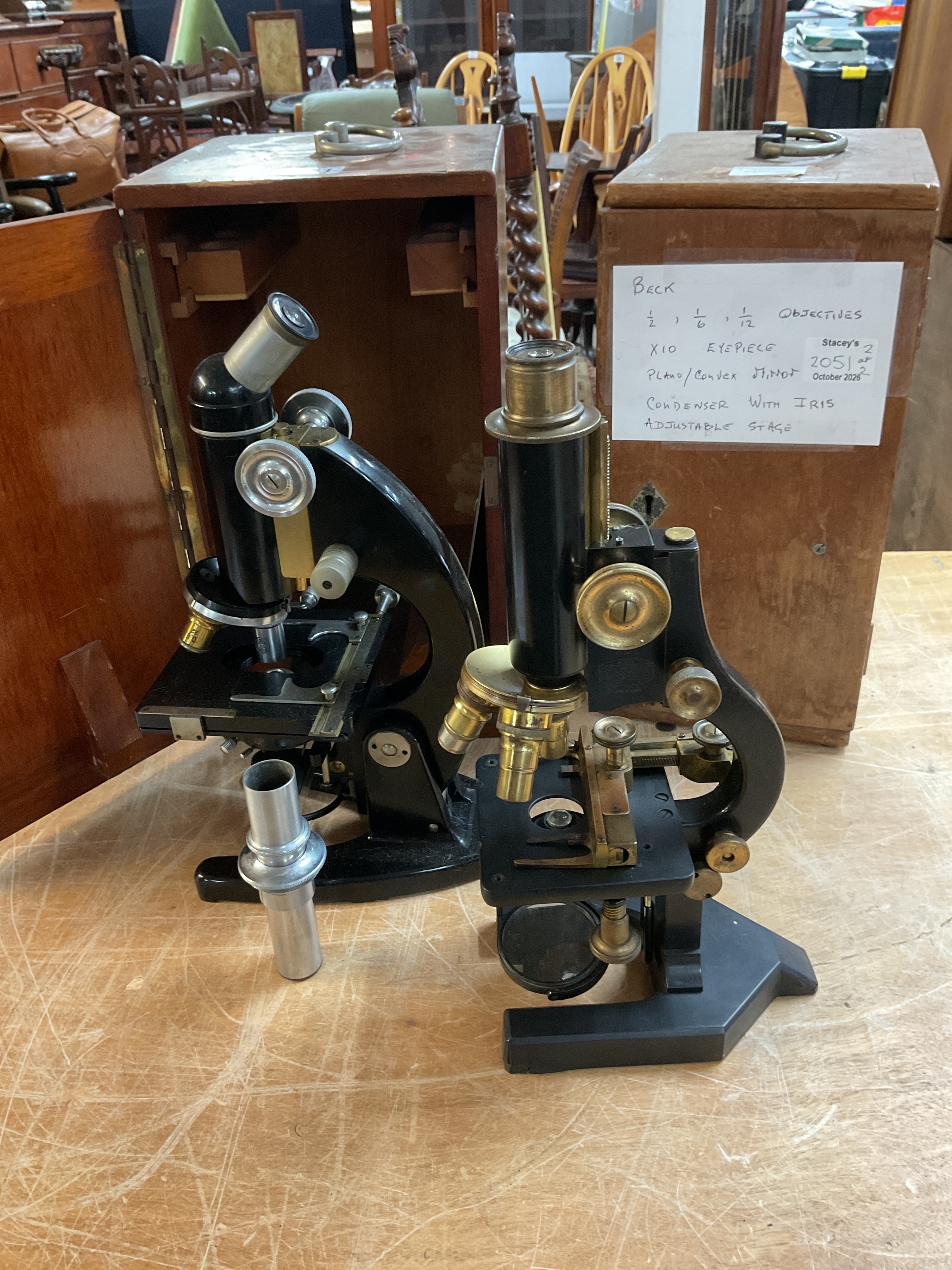 Boxed C Baker microscope model 33590 and boxed Beck Standard London Model 1 .