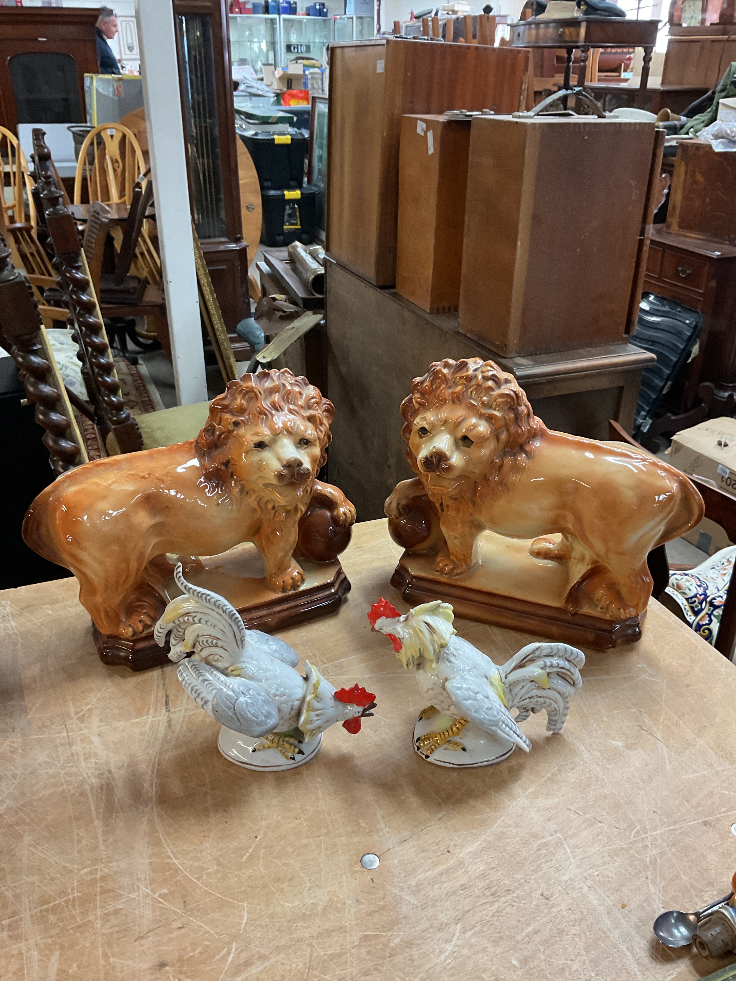 Pair of large lions and pair of Cockerels.