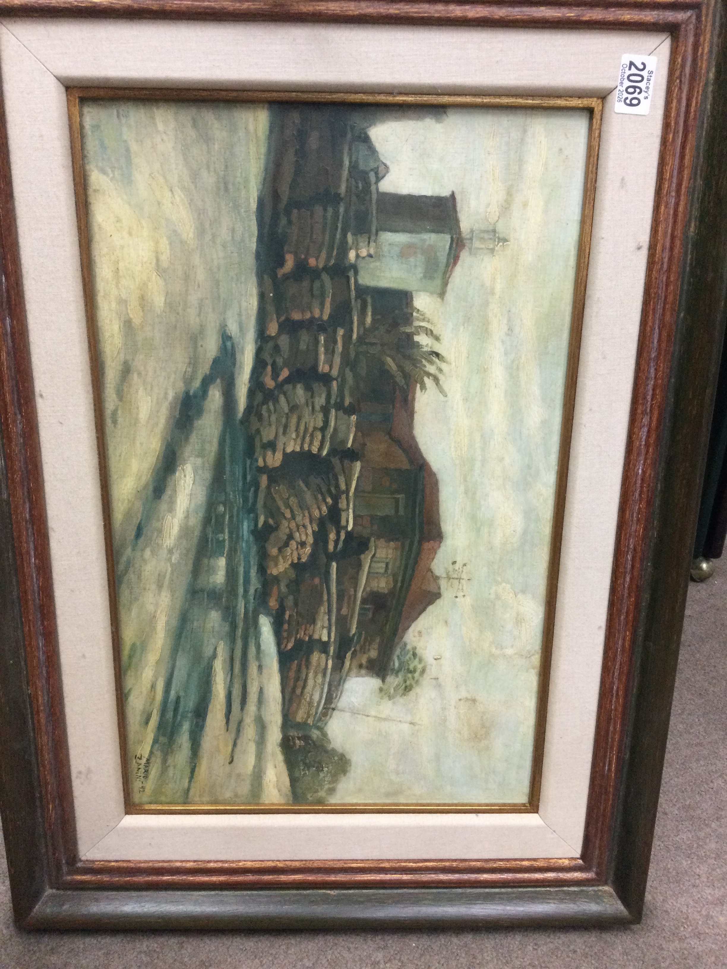 Framed oil painting depicting a rustic building. Signed Mario Zanins. Length 35cm, height 60cm.