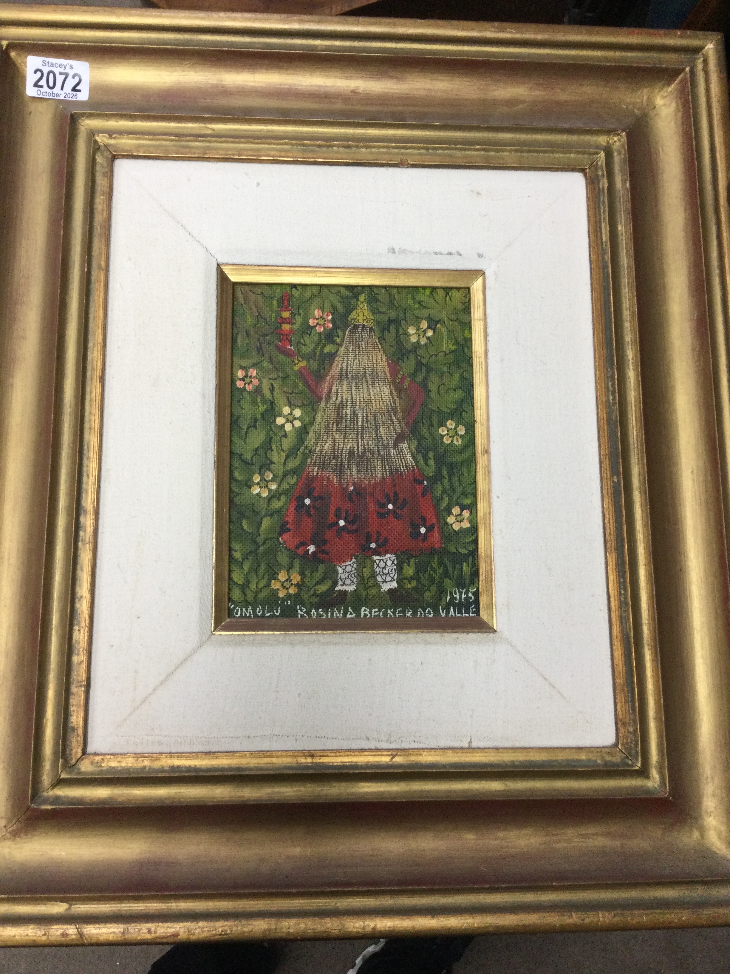Framed oil on board entitled omolu signed Rosina Becker 1975. Width 15cm, height 22cm. 