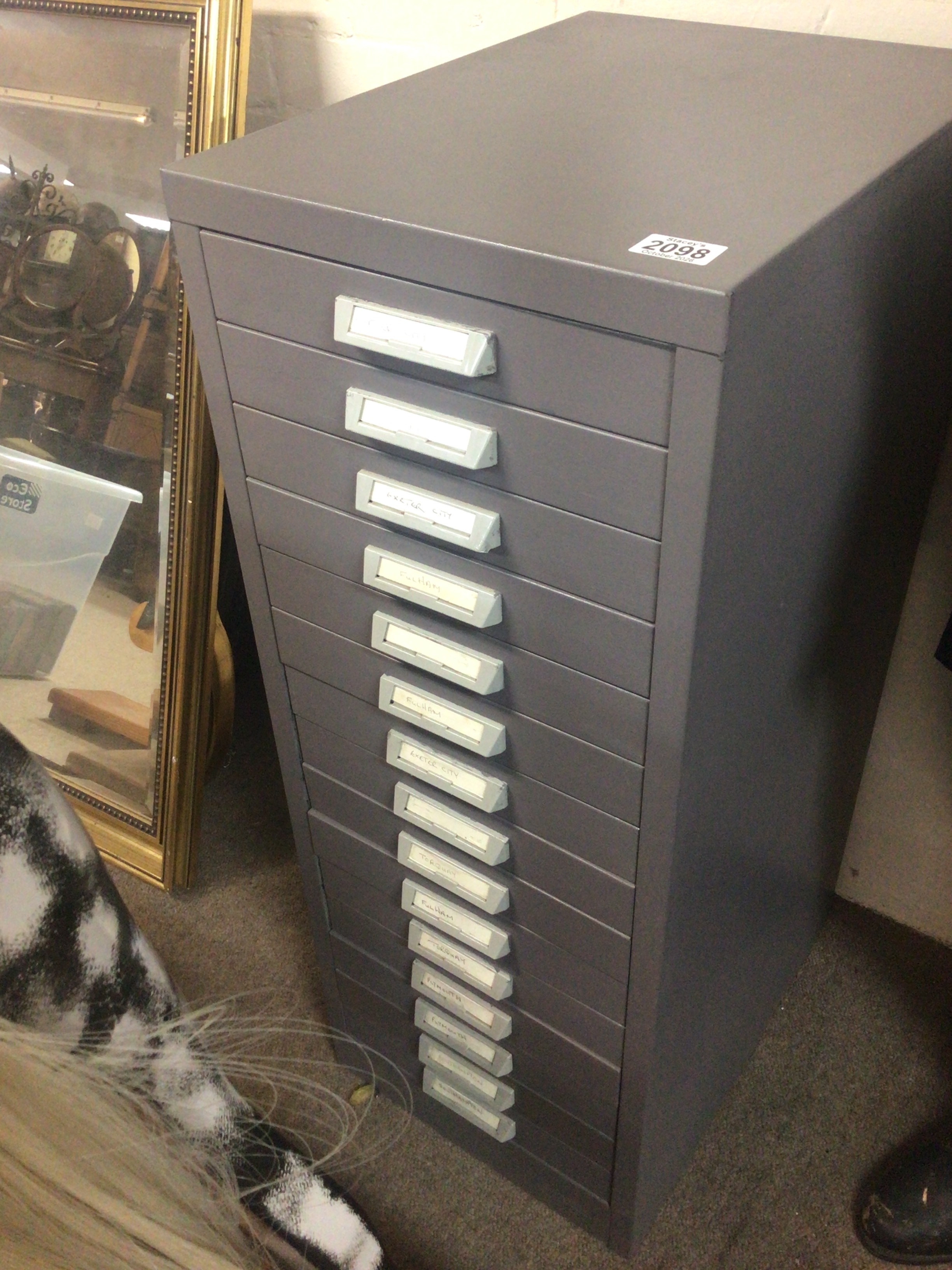  A metal collector cabinet with a flight of fifteen drawers. Good condition. Height 90cm 