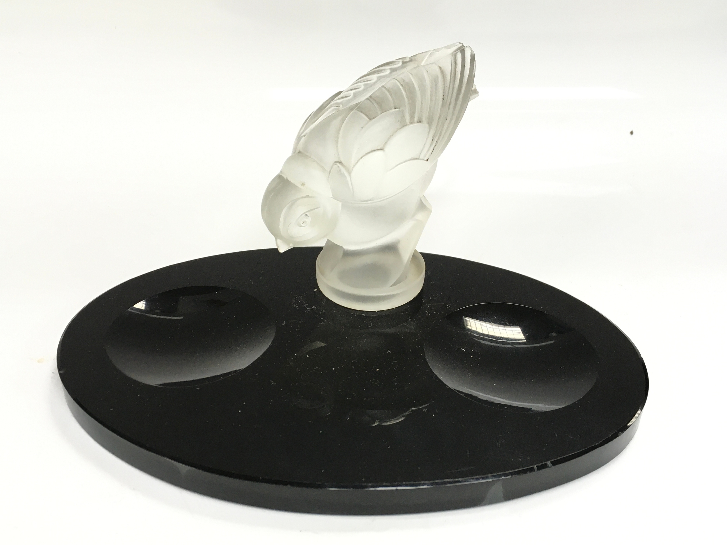 Vintage Art Deco style frosted crystal bird figurine mounted on a black dual dish base