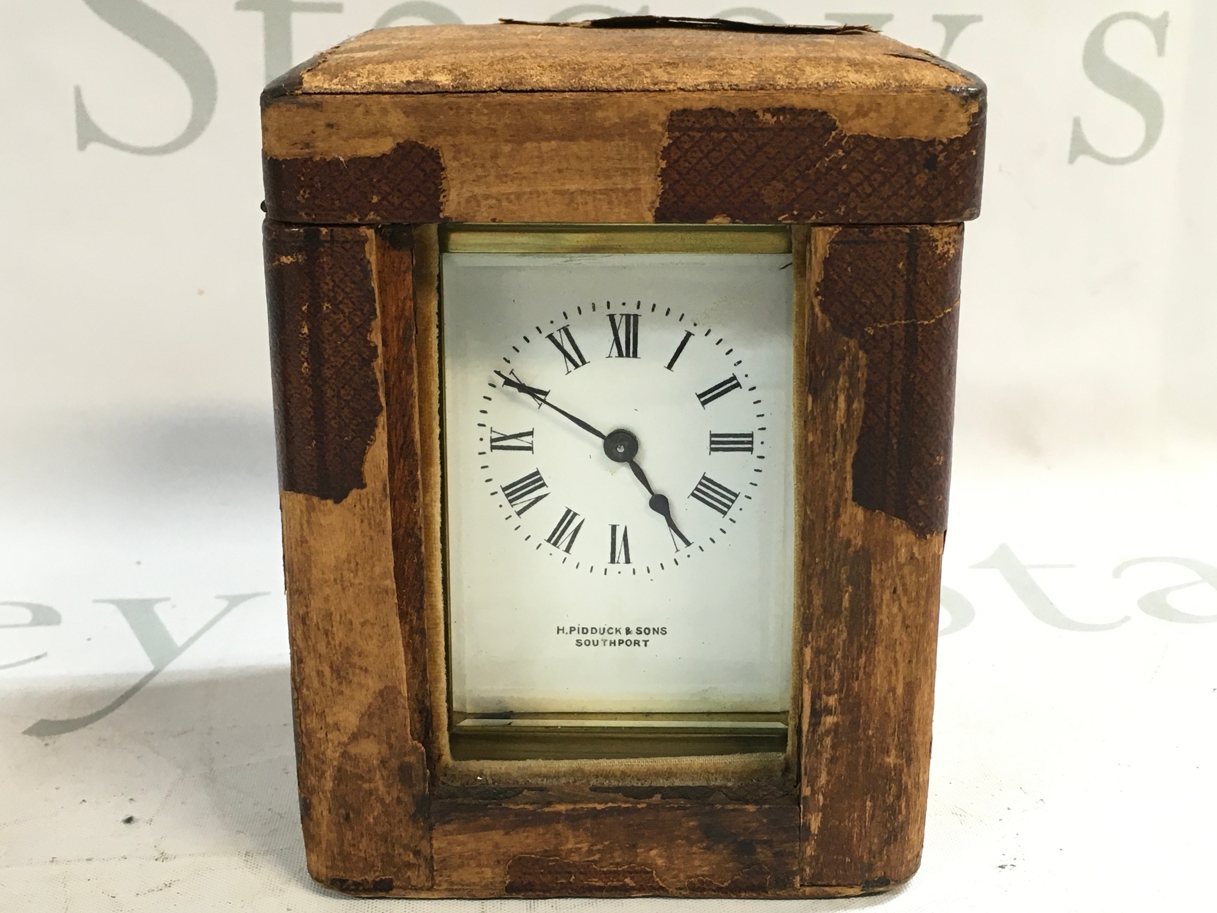 A brass cased carriage clock in a fitted case (not seen working) H.Pidduck & Sons Southport 