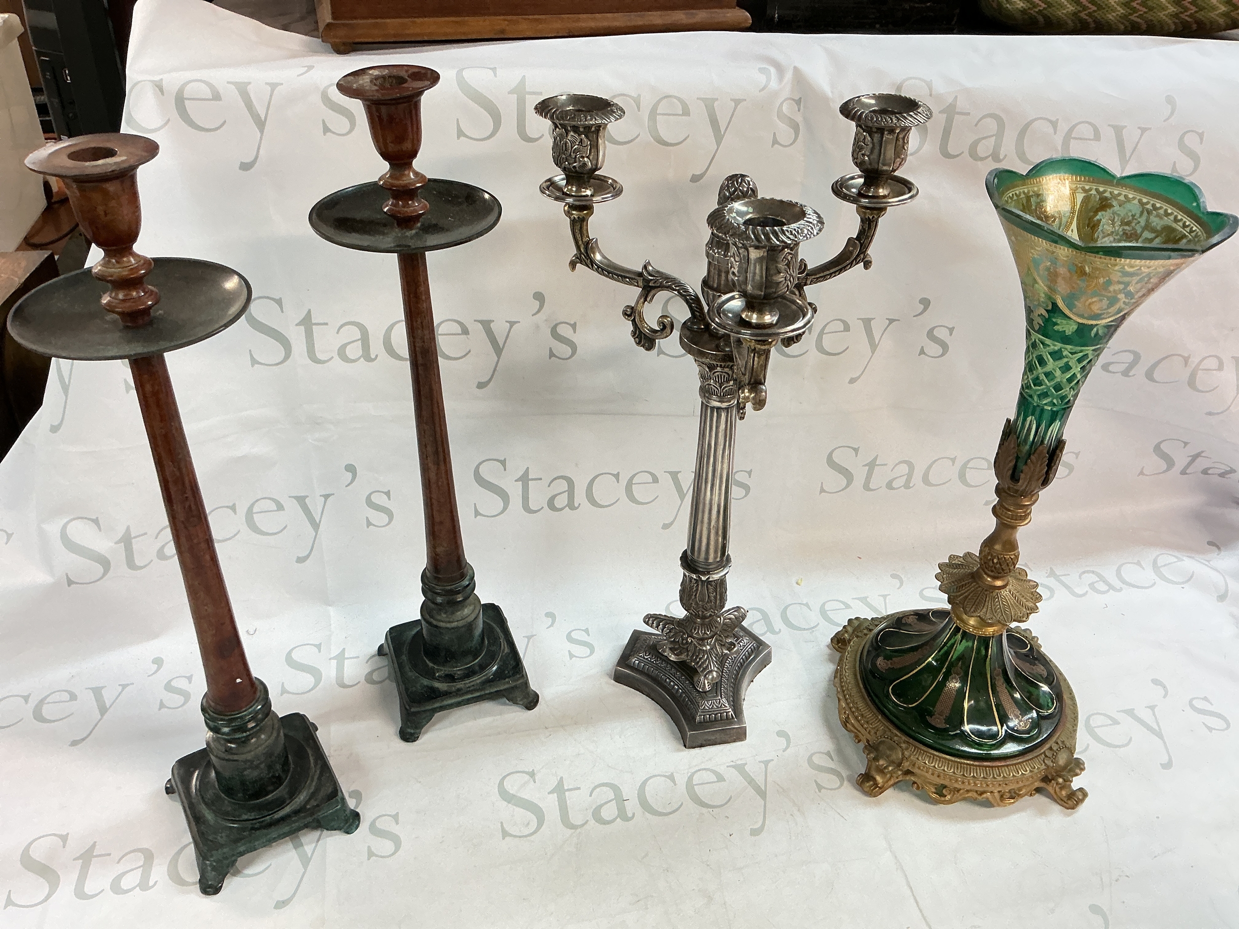 A pair of metal candlesticks, Silver plated candelabra green and gold Bohemian-style glass and brass table epergne. Tallest 52cm