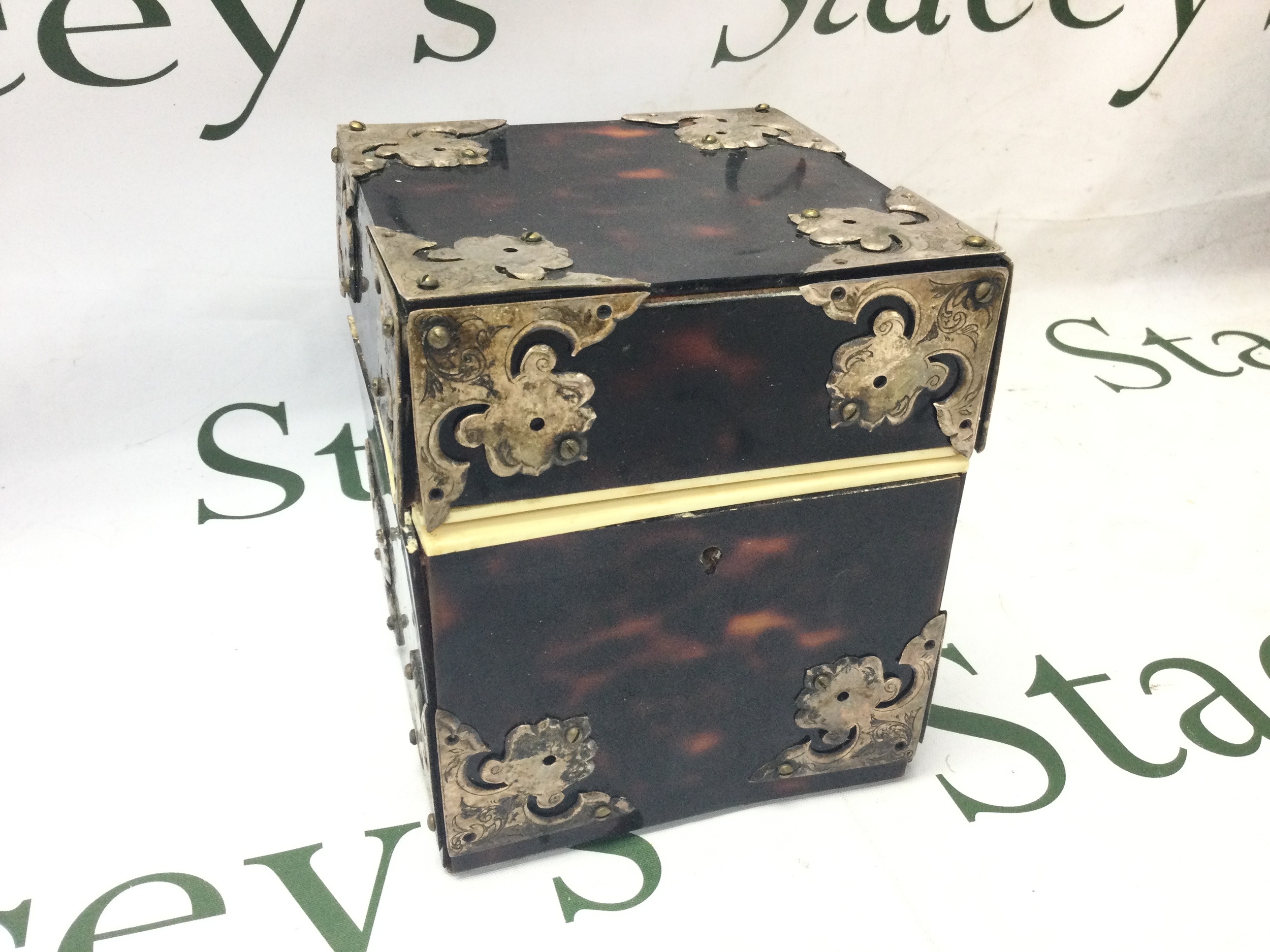 A tortoiseshell box. Width 13cm, height 15cm.
