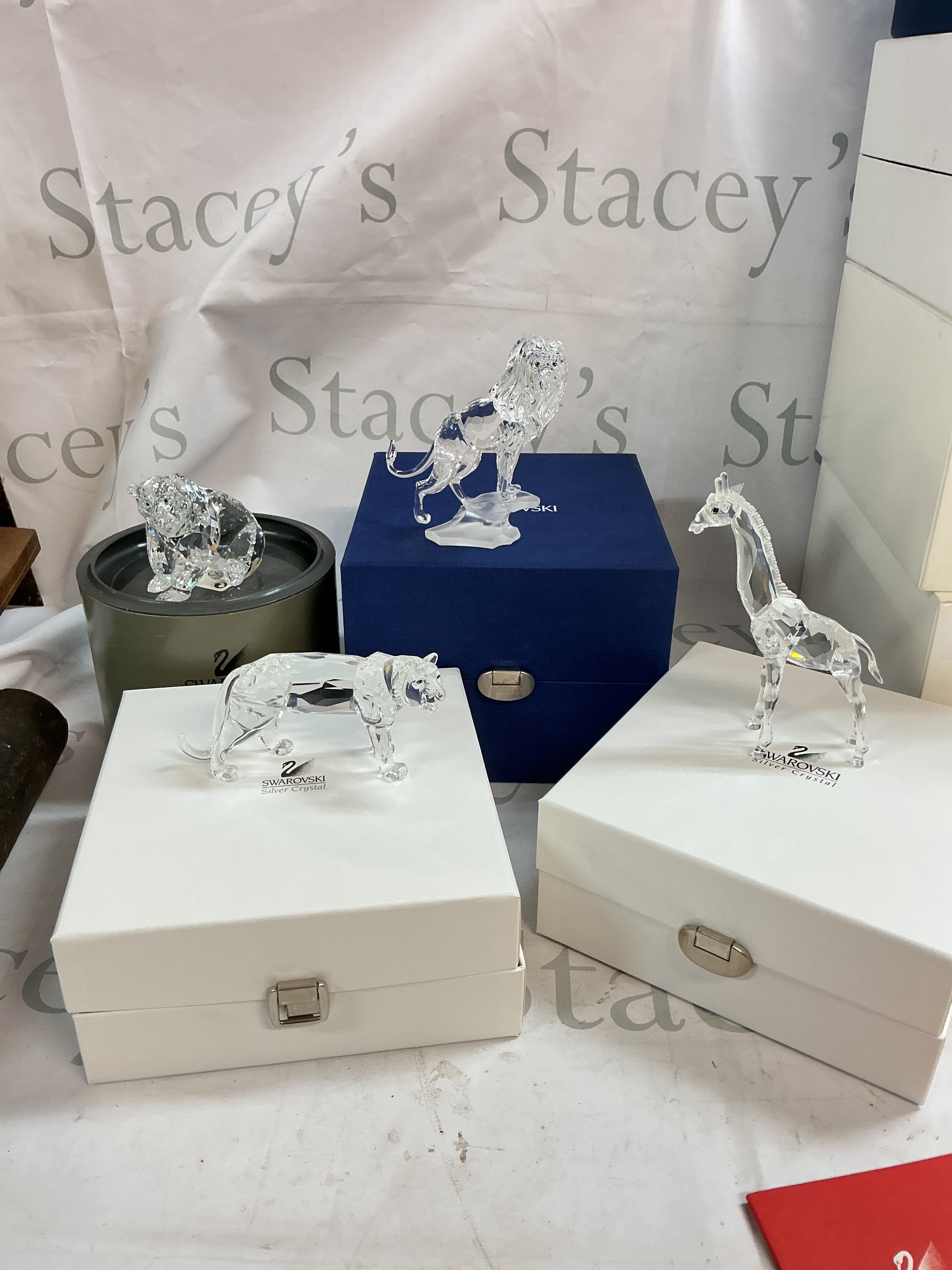 A collection of Four Swarovski crystal animal figures 