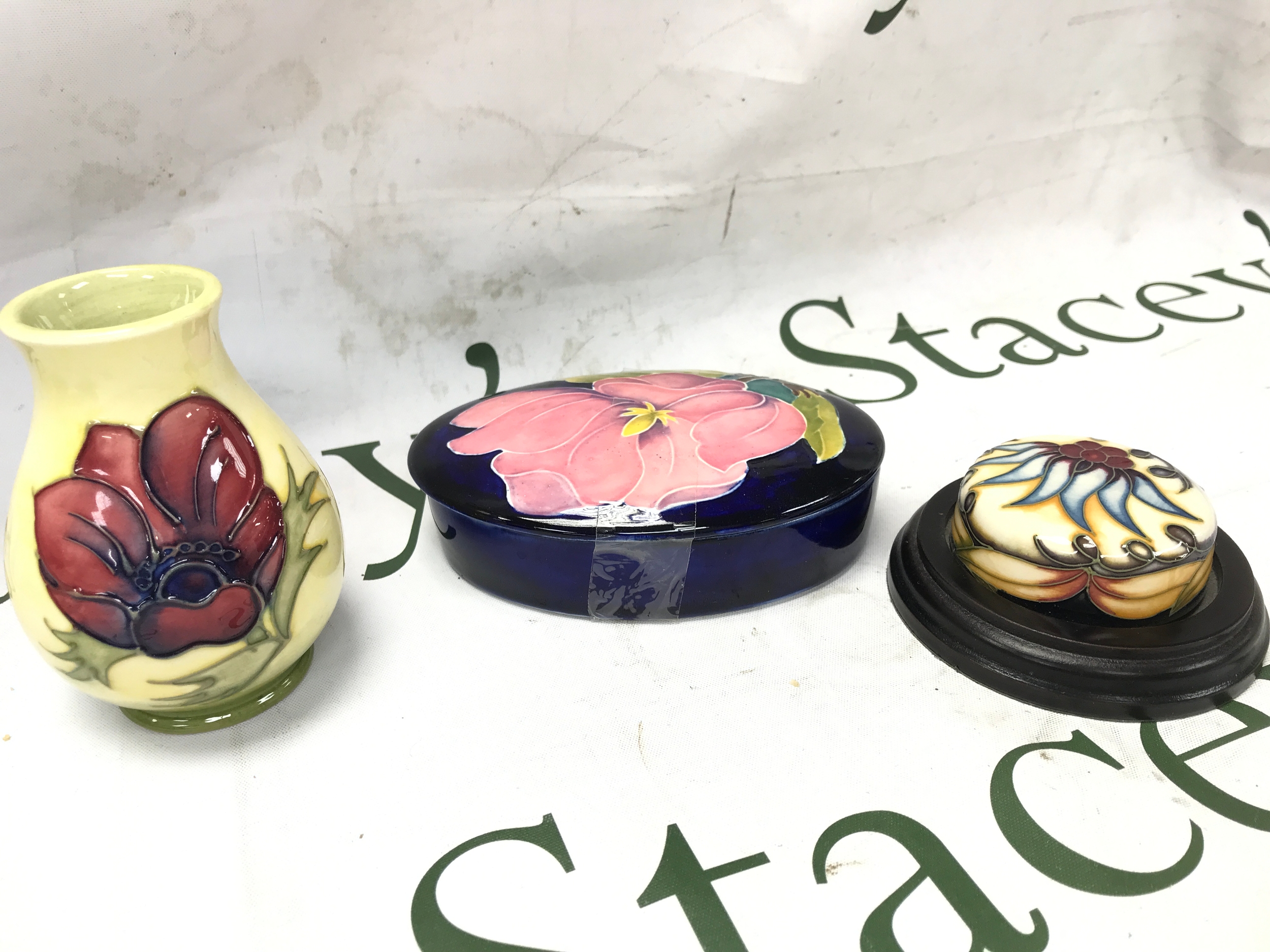 Three Moorcroft items a dish + lid, paperweight , vase 