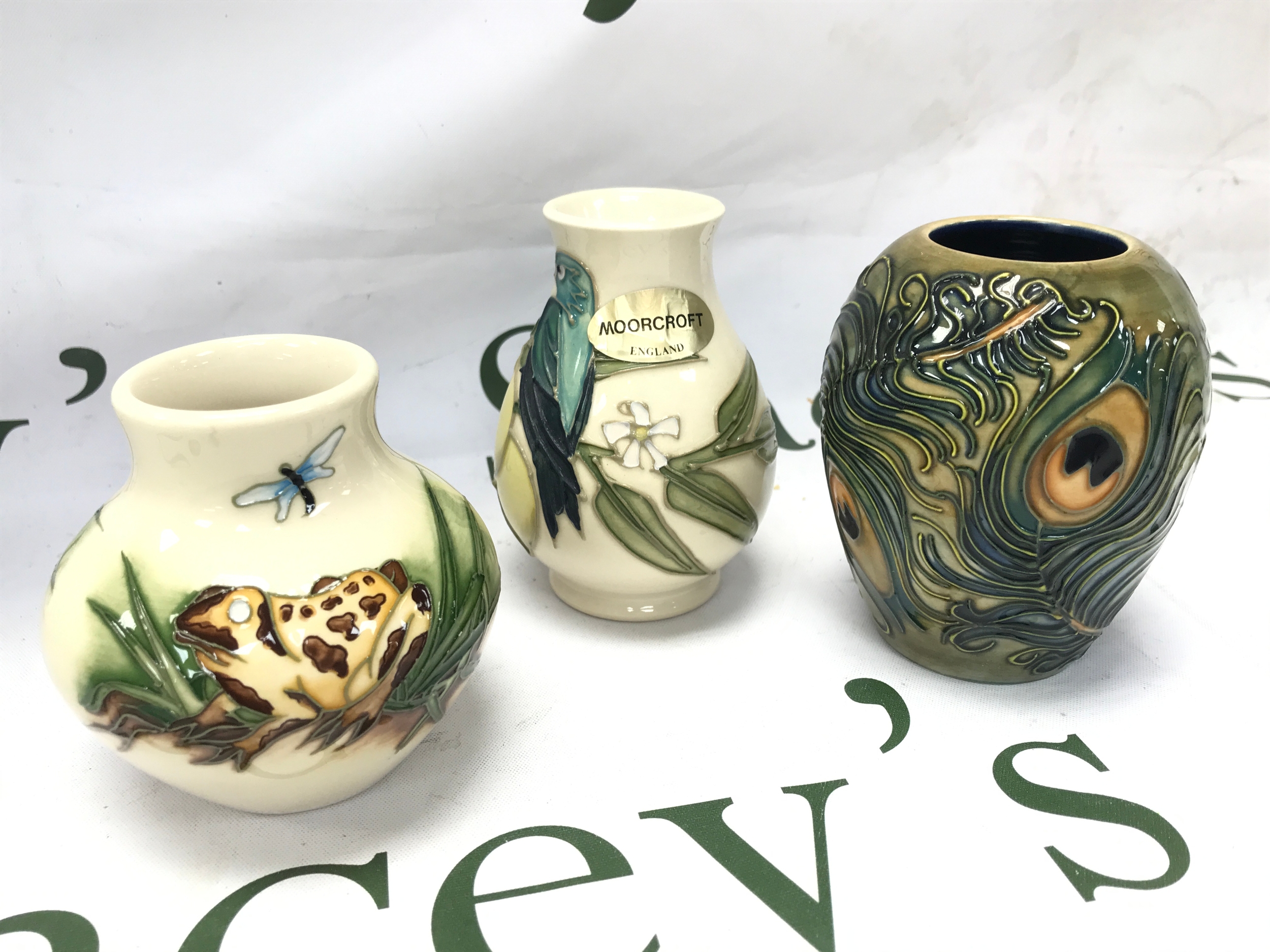 Three Moorcroft vases 8 to 10cm tall 