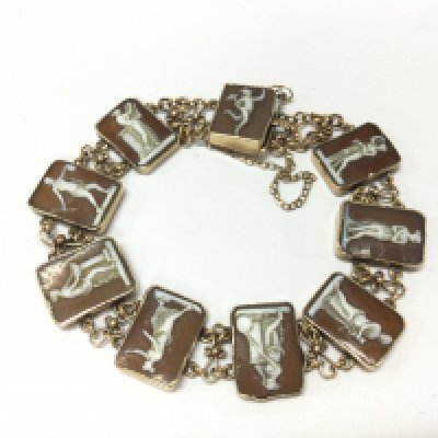 A 9ct gold and cameo grand tour bracelet. 17.35g