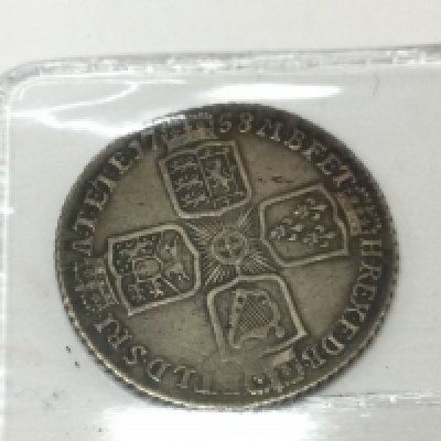 A 1758 GII shilling. Postage A