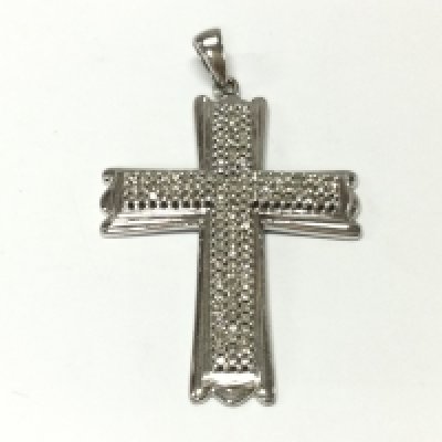 A 9ct white gold diamond cross. Approximately 1ct diamonds and 8.5g