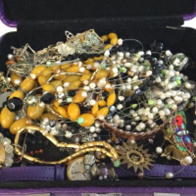 A small collection of costume jewellery including some silver. Postage cat A