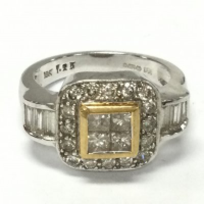 An 18ct white and yellow gold round and princess cut diamond cluster ring. Size N and approximately 1.25ct diamonds and 7g