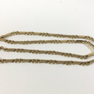 A 9ct gold bar and curb link chain, Approx 20&#2013266057۝ long, Approx weight 30.52 grams.