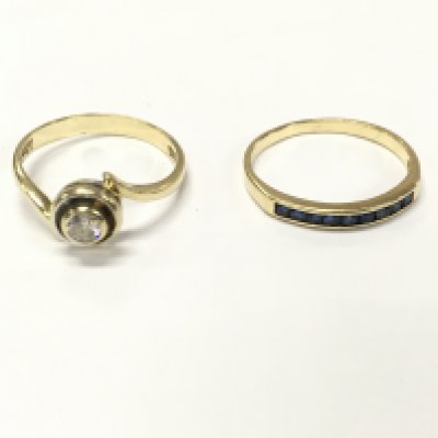 A 14ct gold diamond solitaire ring size O and a 14ct sapphire 1/2 hoop ring size N 3.86g total.
