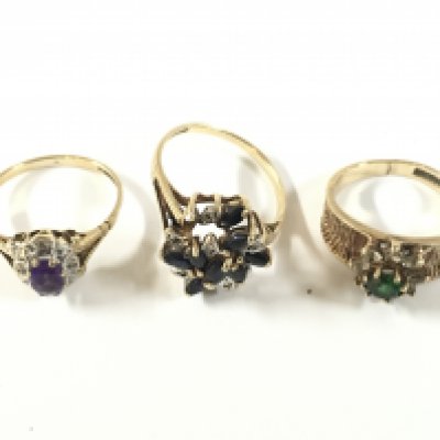 Three 9ct gold stone set ring approx weight, 7.36 grams.