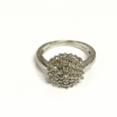 A 9ct white gold diamond cluster ring, approx 5.3g and approx size P-Q. Shipping category A.