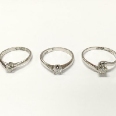 Three 18ct white gold diamond solitaire rings. Sizes J L and P approximately 7.6g