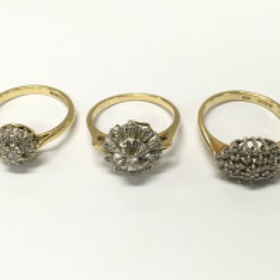 Three 18ct gold diamond cluster rings. Sizes K L1/2 approximately 9.6g