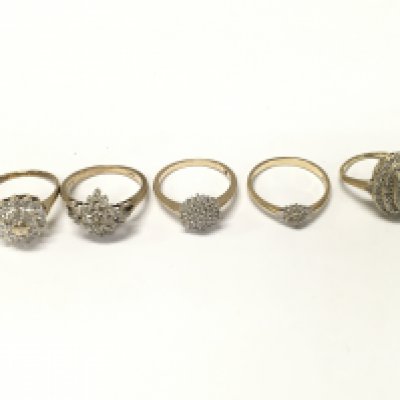Five 9ct gold diamond cluster rings. Sizes I N N1/2 O and approximately 12.2g Postage A