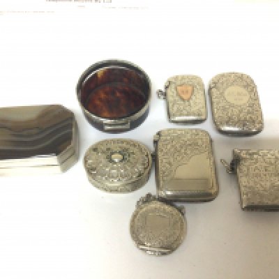 A collection of silver Vesta cases a polished George III silver and agate box (damaged) and others