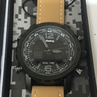 An Infantry Military style watch dual time Chronograph with digital display as new in a fitted box with warranty card may need a new battery.
